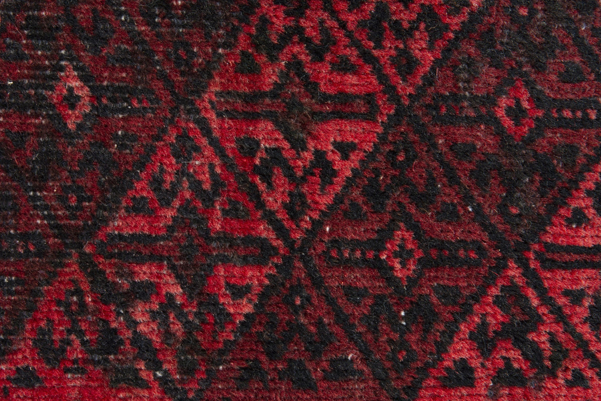 Persian Baluch accent rug in deep red and black, view 7 of 9