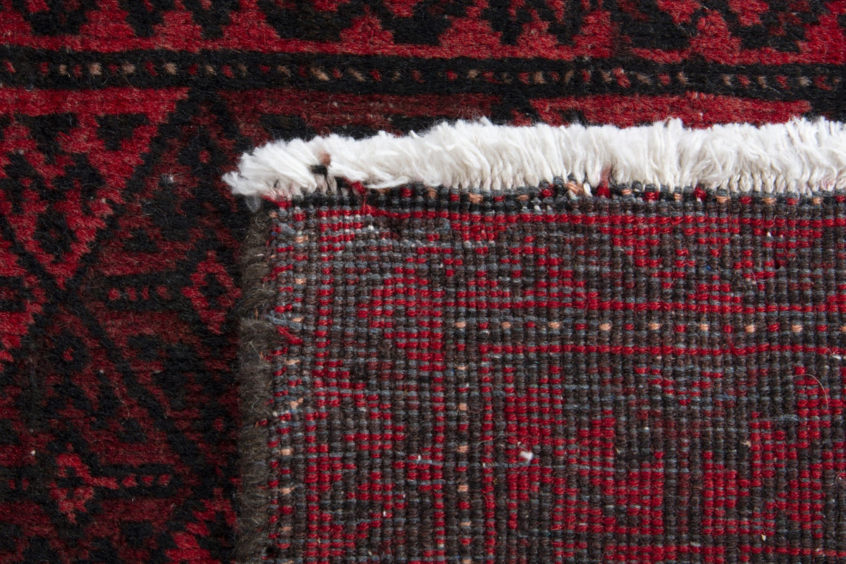 Persian Baluch accent rug in deep red and black, view 9 of 9