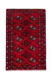 Persian Torkaman accent rug in deep red and black, view 2 of 9