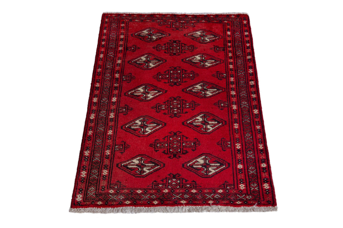 Persian Torkaman accent rug in deep red and black, view 4 of 9