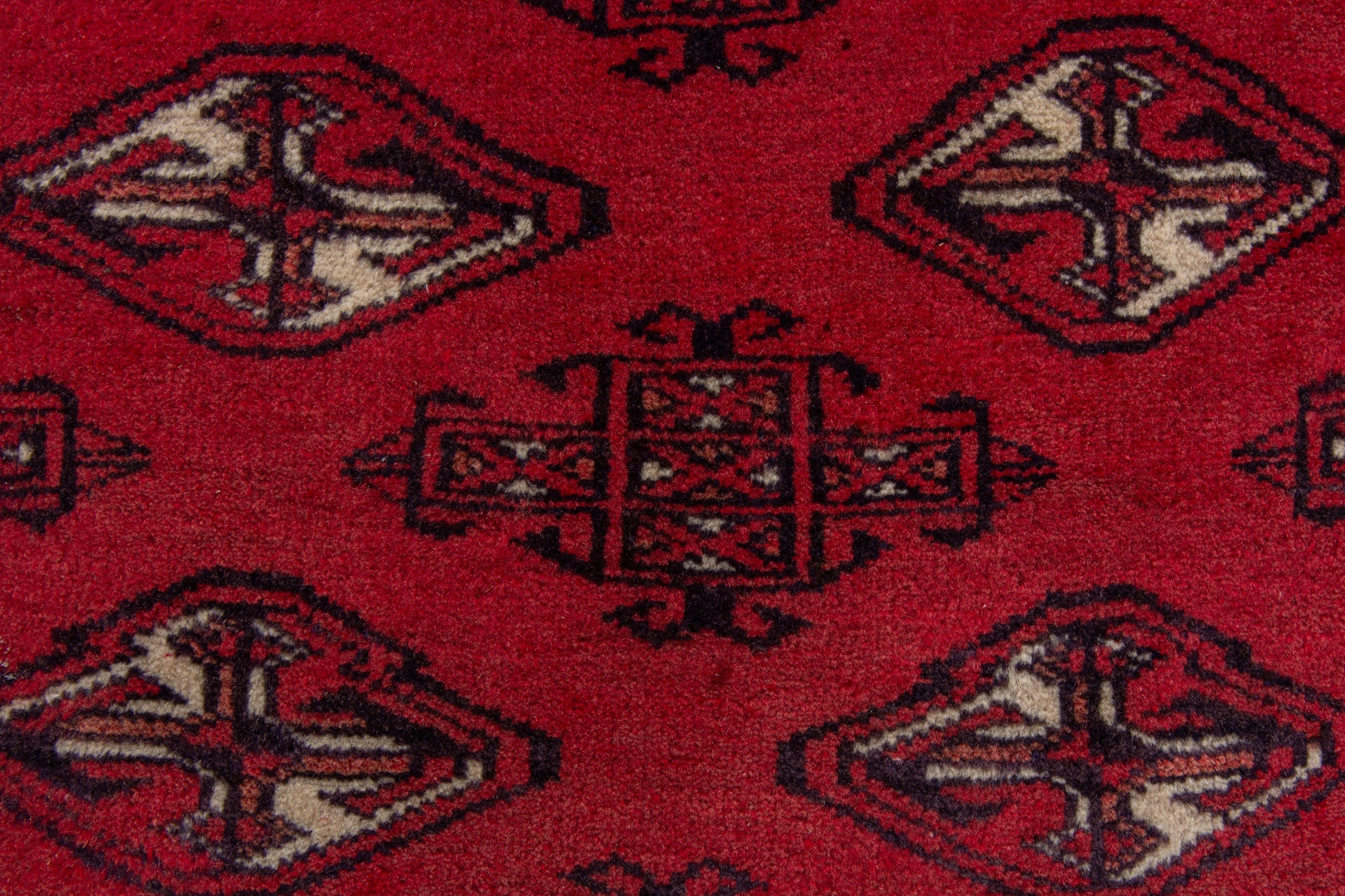 Persian Torkaman accent rug in deep red and black, view 6 of 8