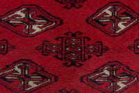Persian Torkaman accent rug in deep red and black, view 7 of 9