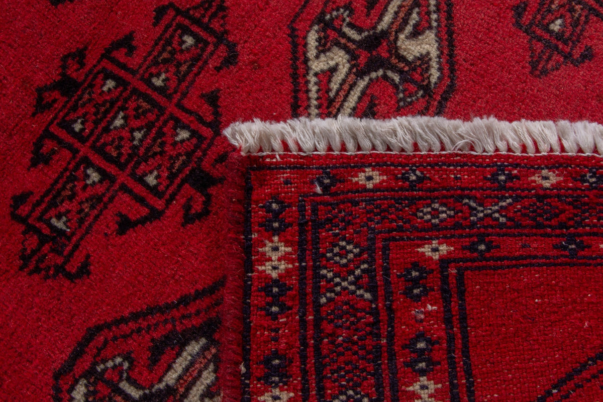 Persian Torkaman accent rug in deep red and black, view 9 of 9