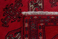 Persian Torkaman accent rug in deep red and black, view 9 of 9