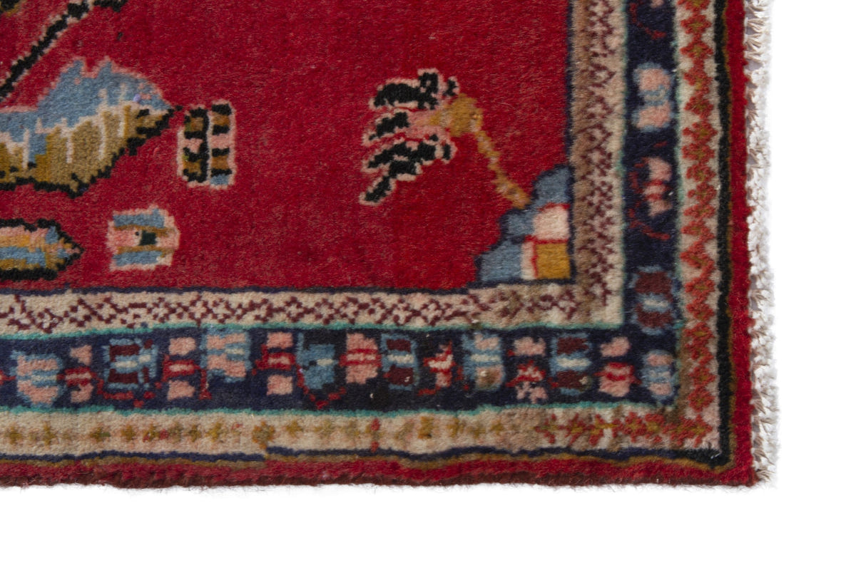 Persian Arak accent rug in deep red and navy, view 5 of 9