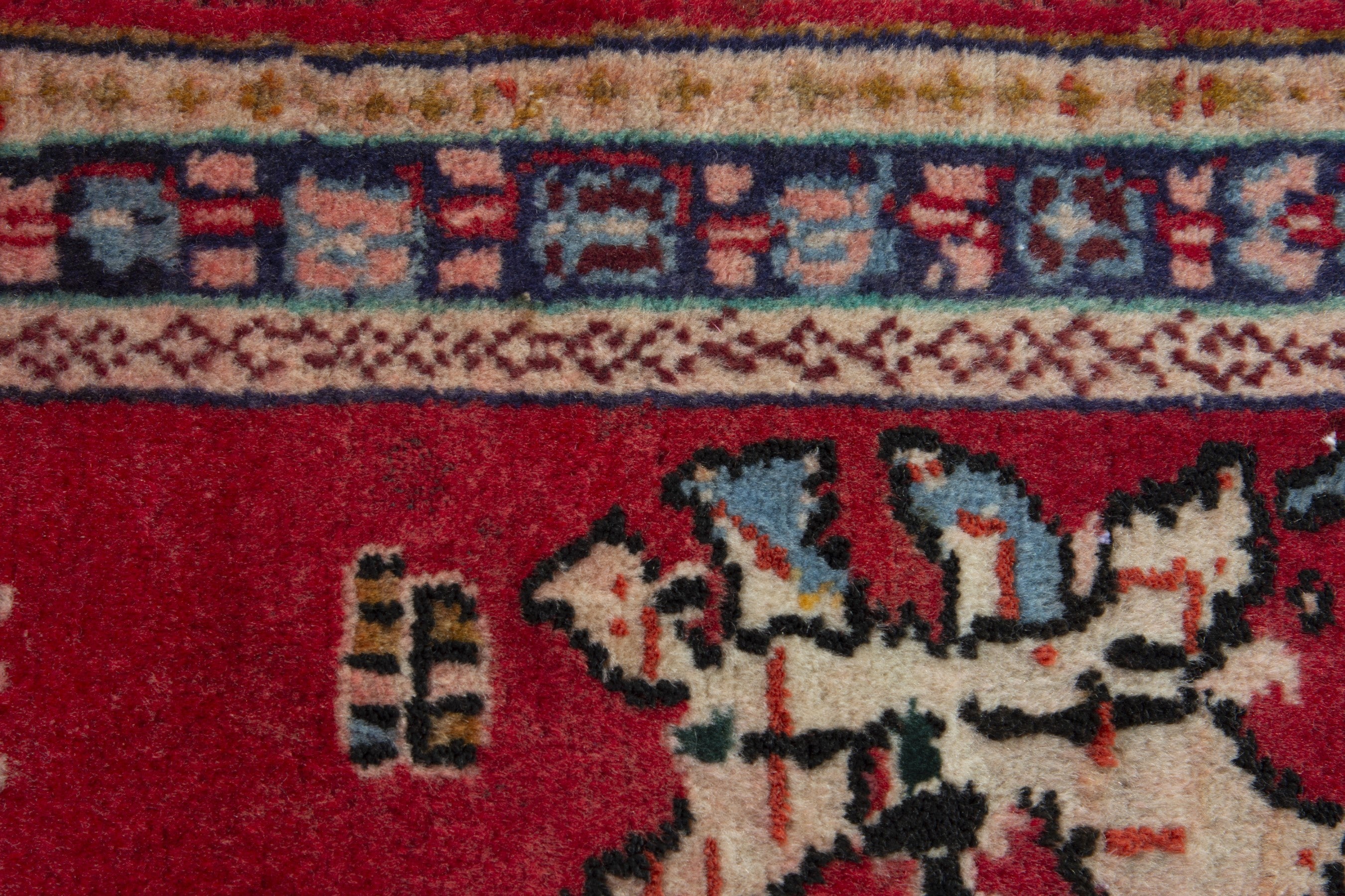 Persian Arak accent rug in deep red and navy, view 7 of 8