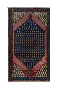 Persian Songhor accent rug in navy and dusty rose, view 2 of 9