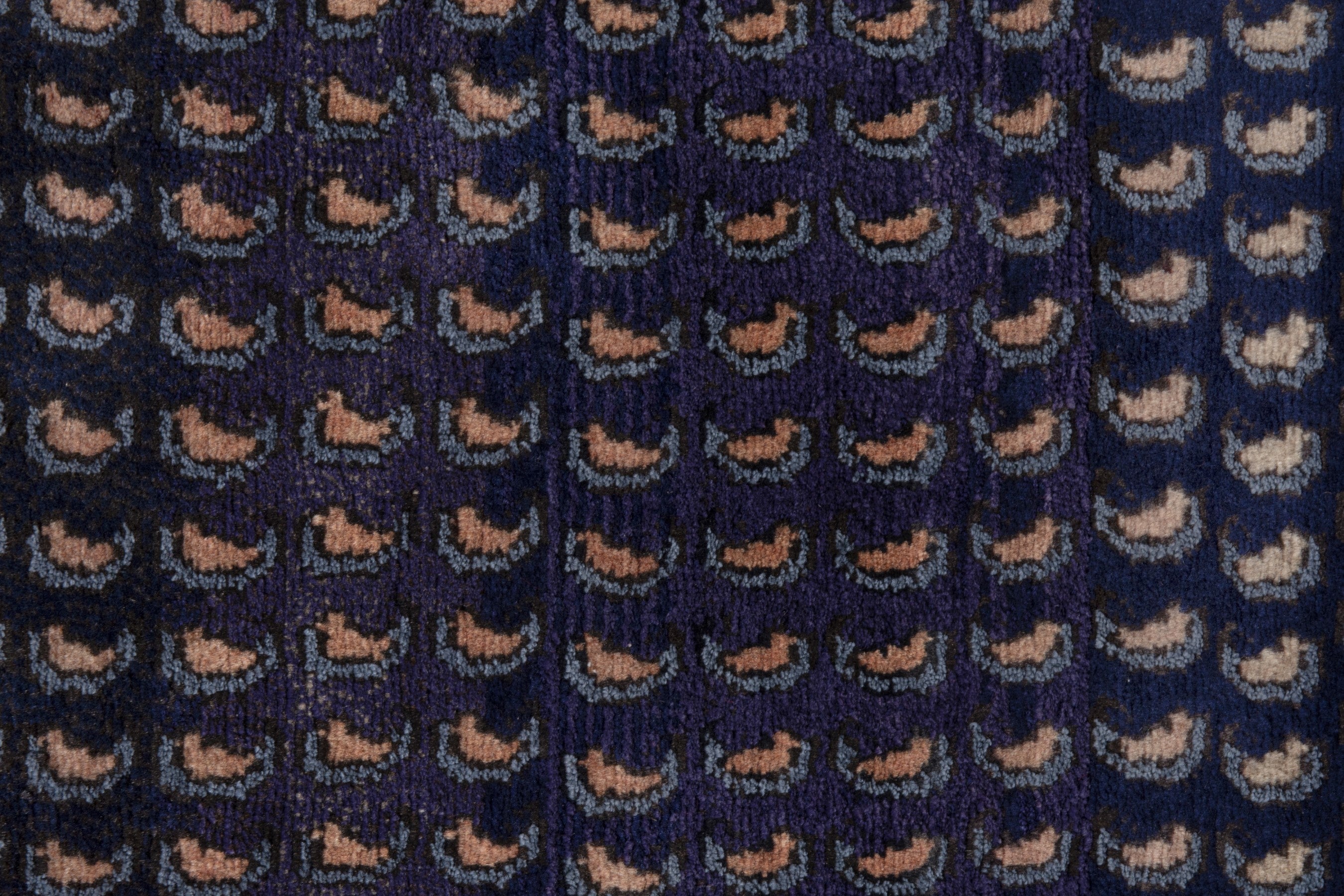 Persian Songhor accent rug in navy and dusty rose, view 7 of 8