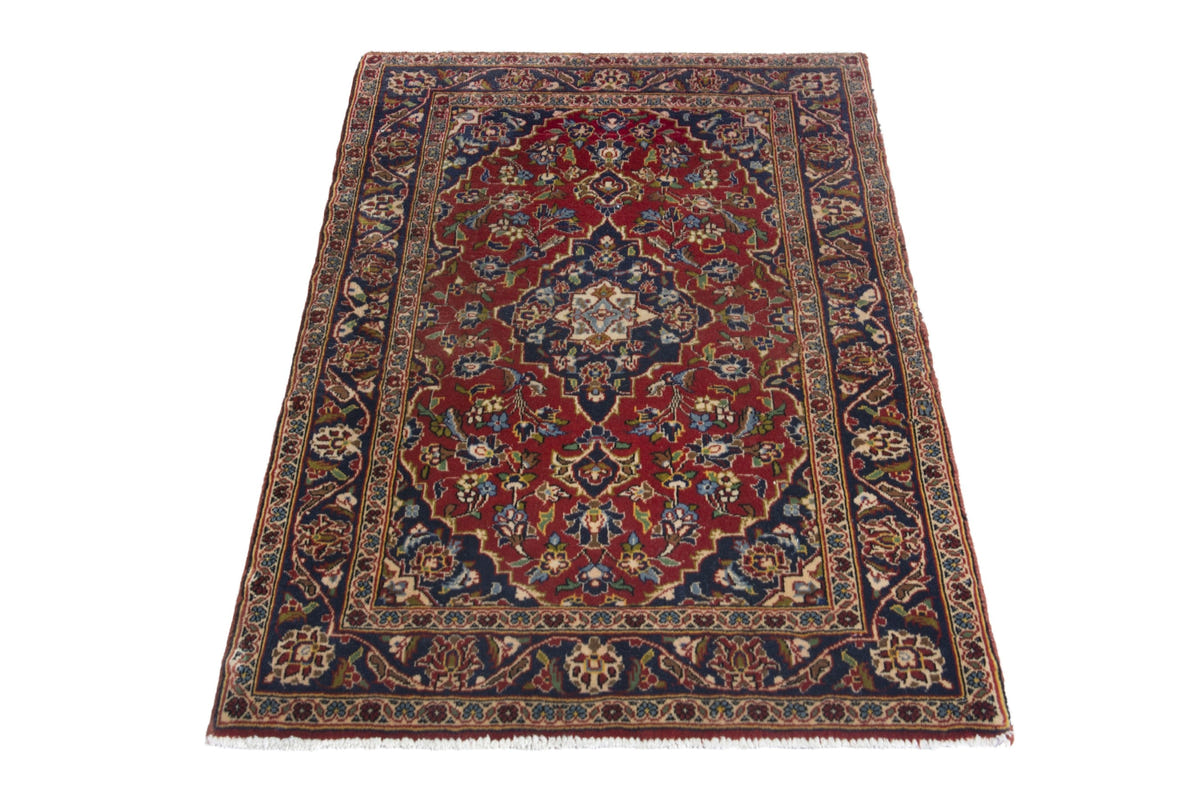 Persian Kashan accent rug in deep red and navy, view 3 of 10