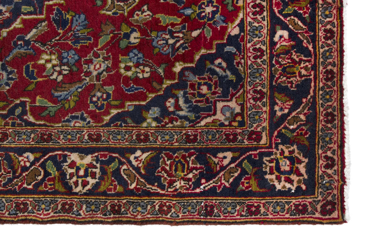 Persian Kashan accent rug in deep red and navy, view 5 of 10