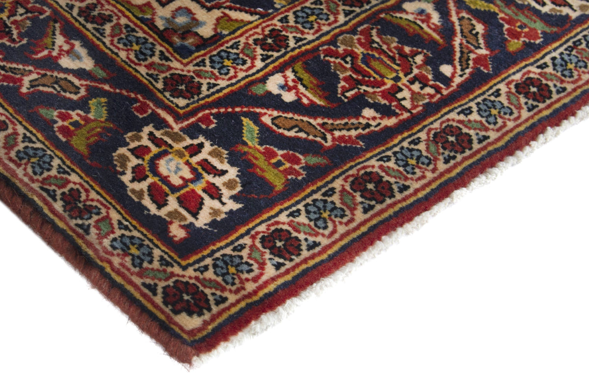 Persian Kashan accent rug in deep red and navy, view 6 of 10