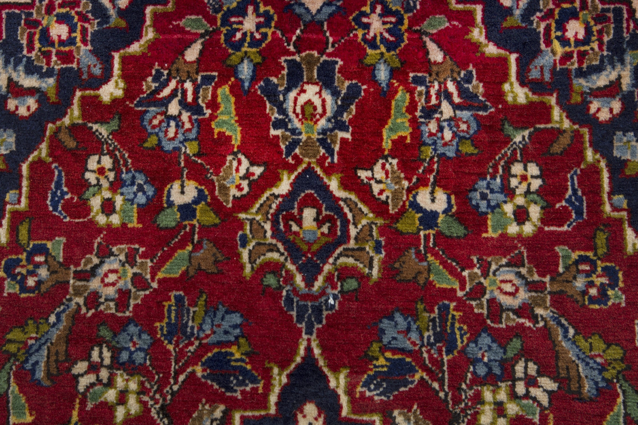 Persian Kashan accent rug in deep red and navy, view 6 of 9