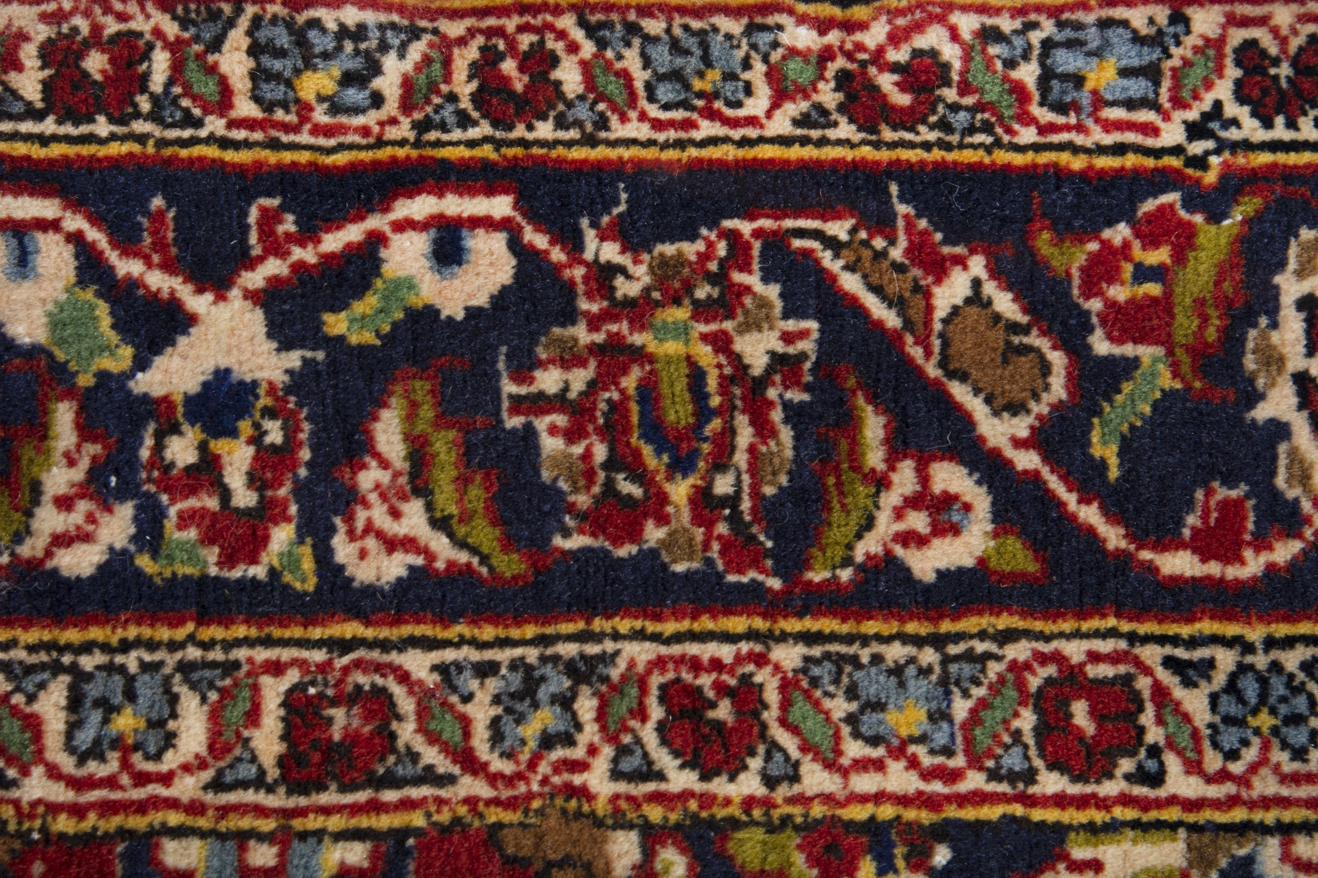 Persian Kashan accent rug in deep red and navy, view 8 of 9
