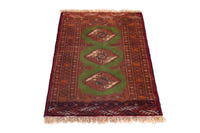 Persian Torkaman accent rug in deep red and olive, view 3 of 9