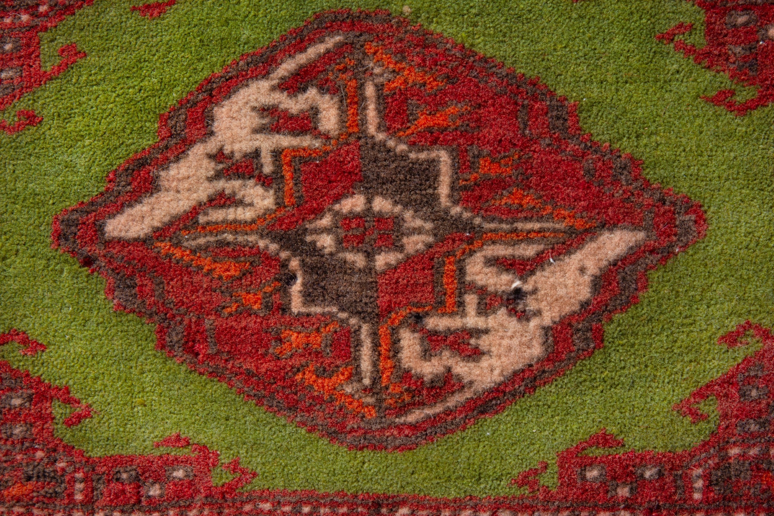 Persian Torkaman accent rug in deep red and olive, view 5 of 8