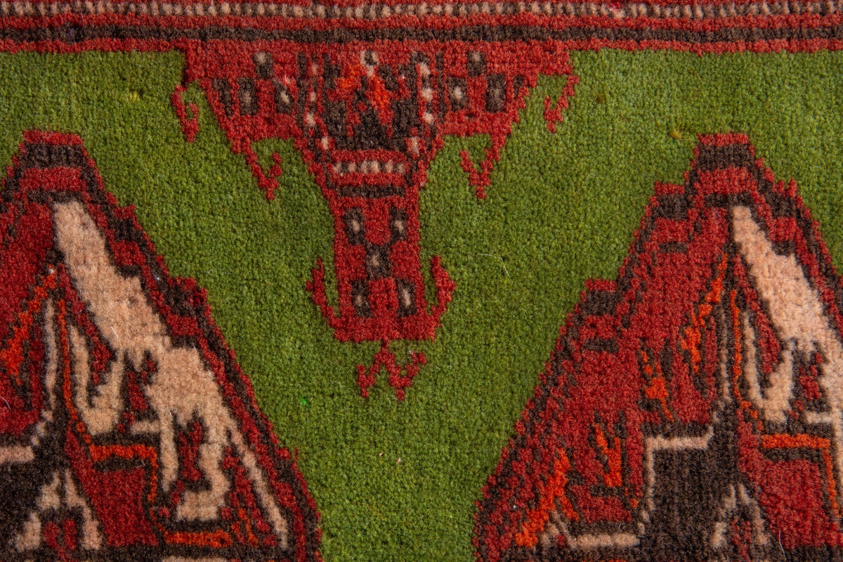Persian Torkaman accent rug in deep red and olive, view 7 of 9