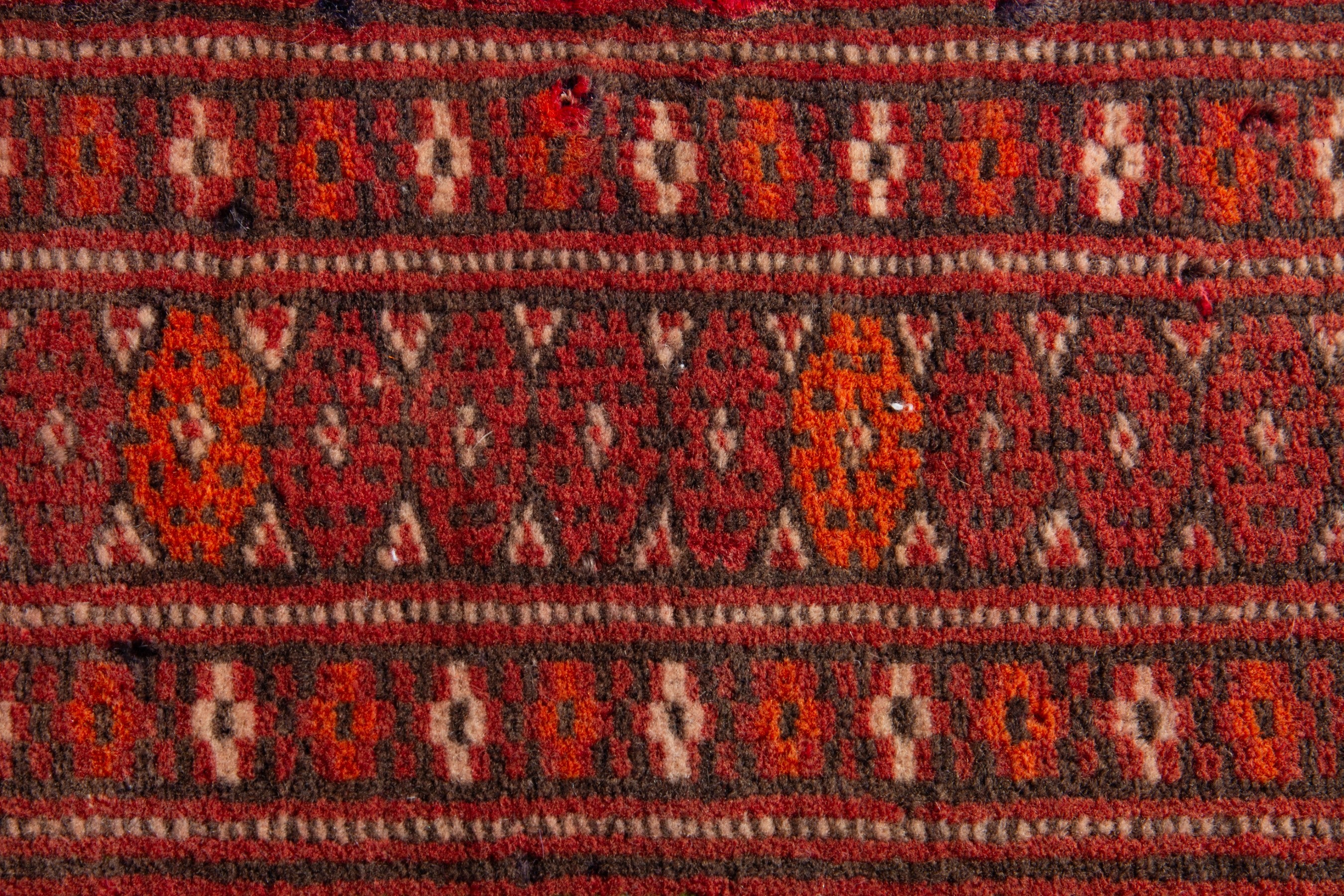 Persian Torkaman accent rug in deep red and olive, view 7 of 8