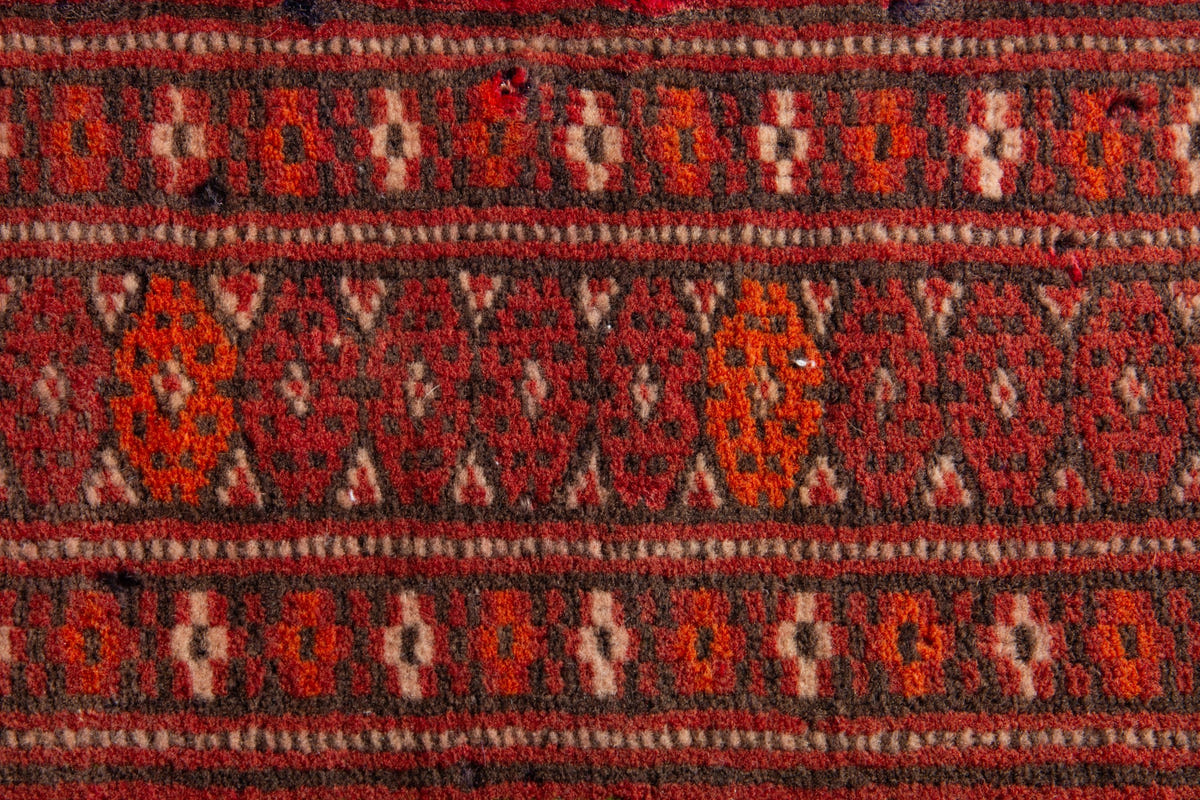 Persian Torkaman accent rug in deep red and olive, view 8 of 9