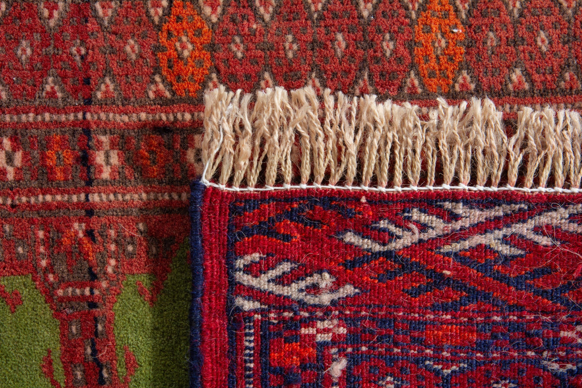 Persian Torkaman accent rug in deep red and olive, view 9 of 9