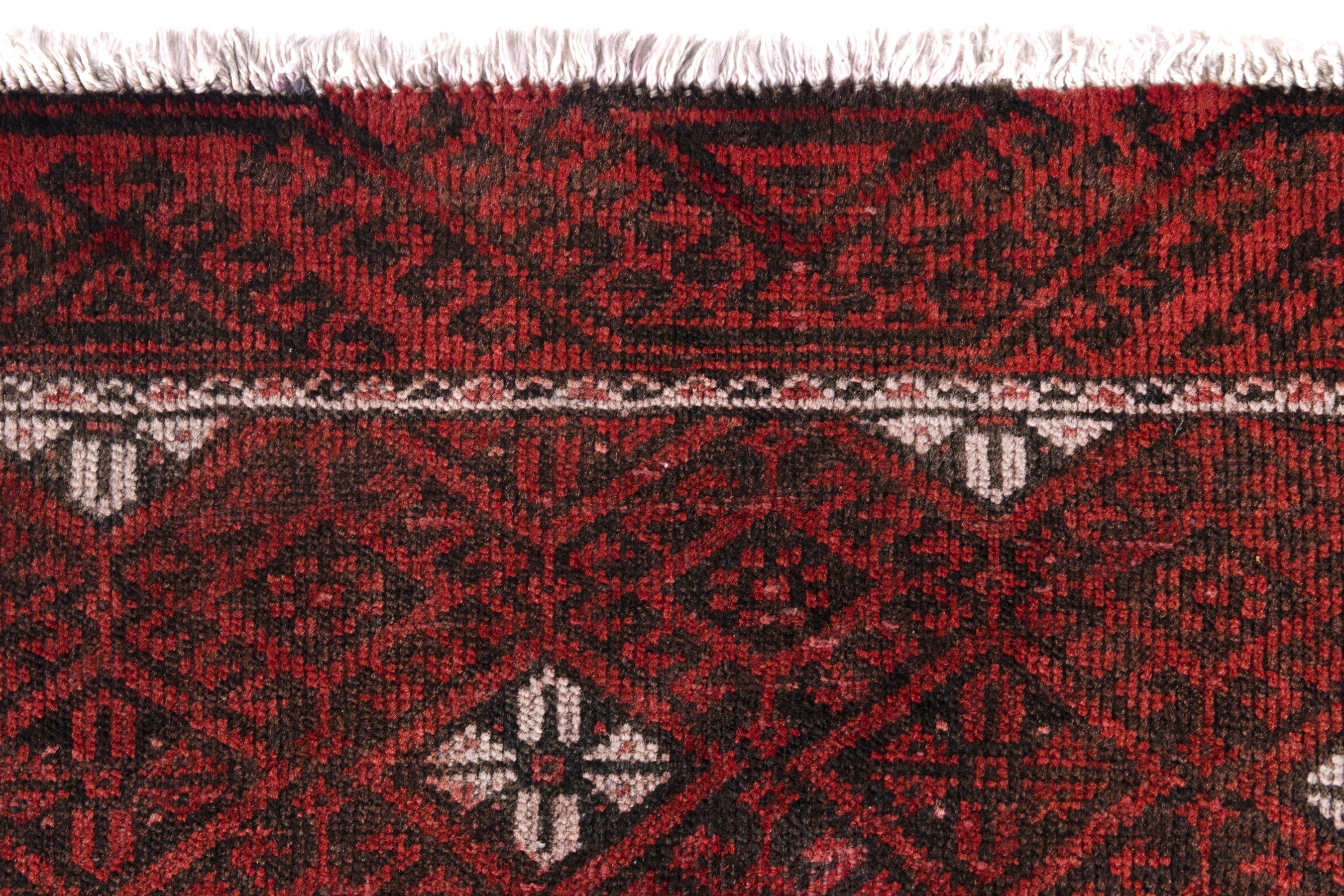 Persian Baluch accent rug in deep red and cream, view 11 of 18