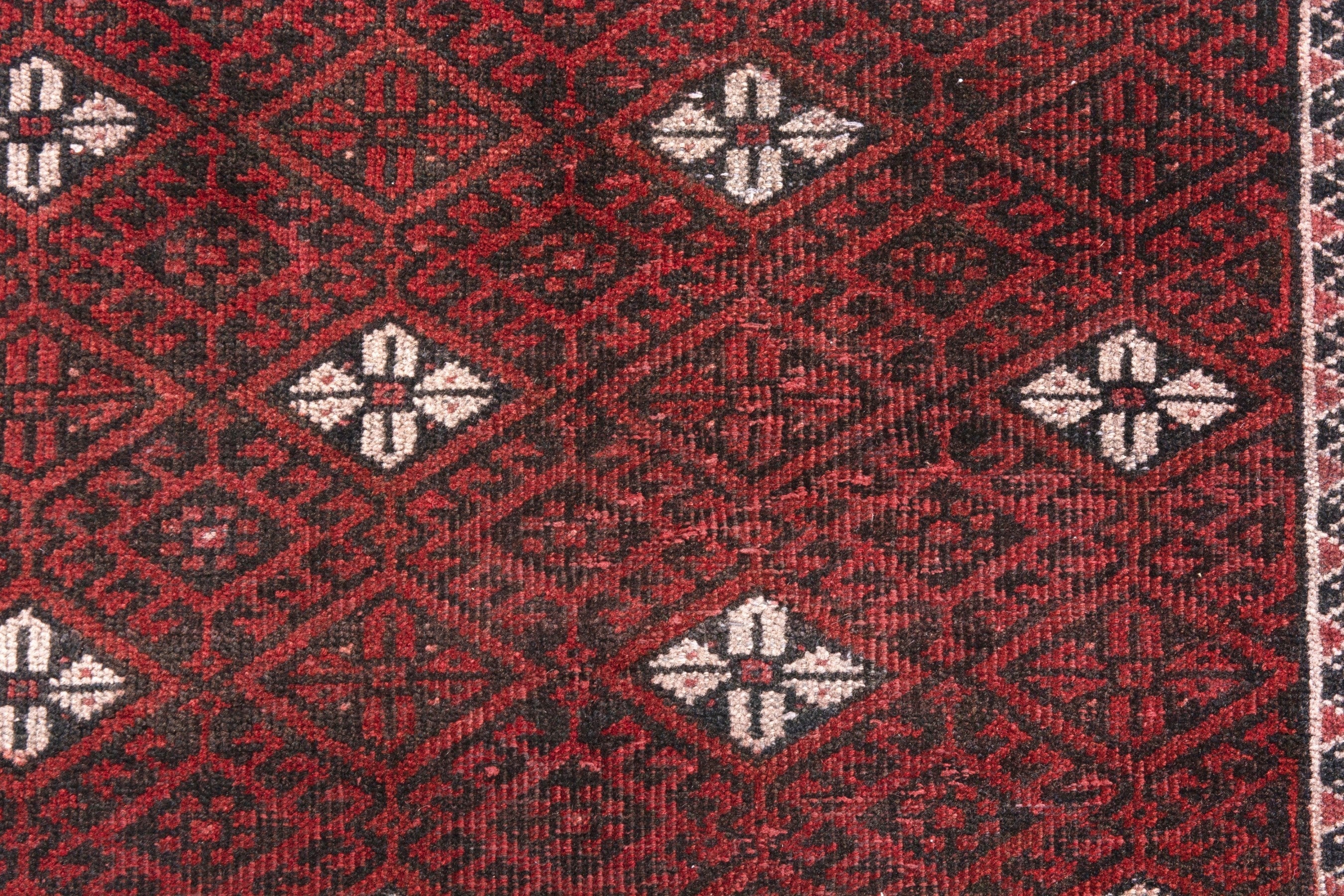 Persian Baluch accent rug in deep red and cream, view 12 of 18