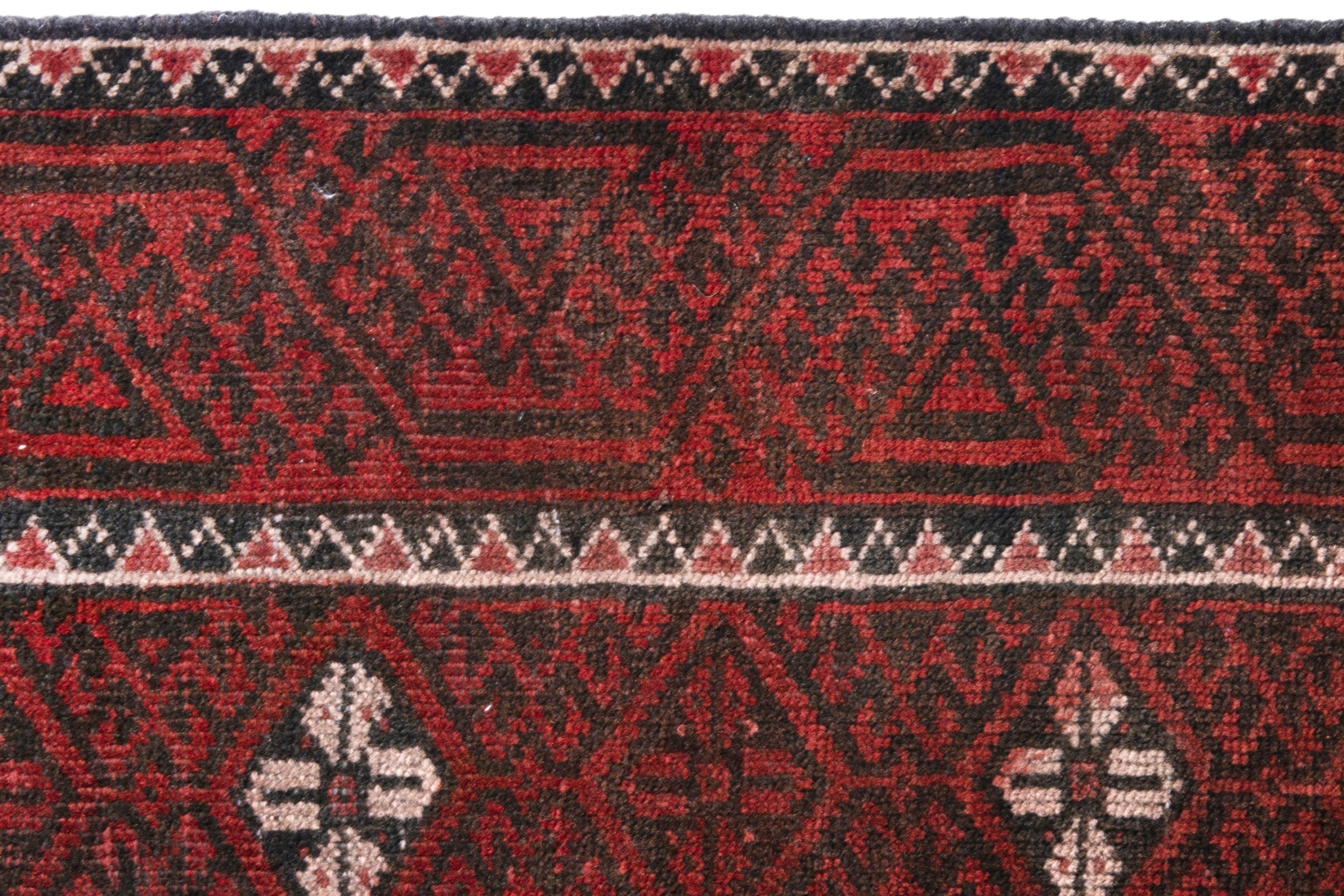 Persian Baluch accent rug in deep red and cream, view 13 of 18