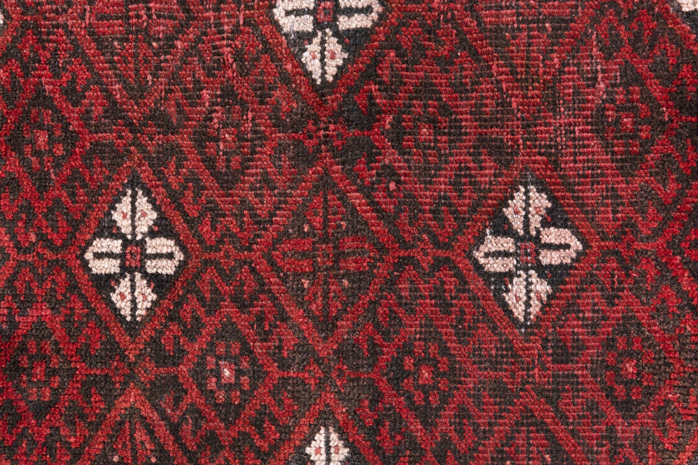 Persian Baluch accent rug in deep red and cream, view 14 of 18