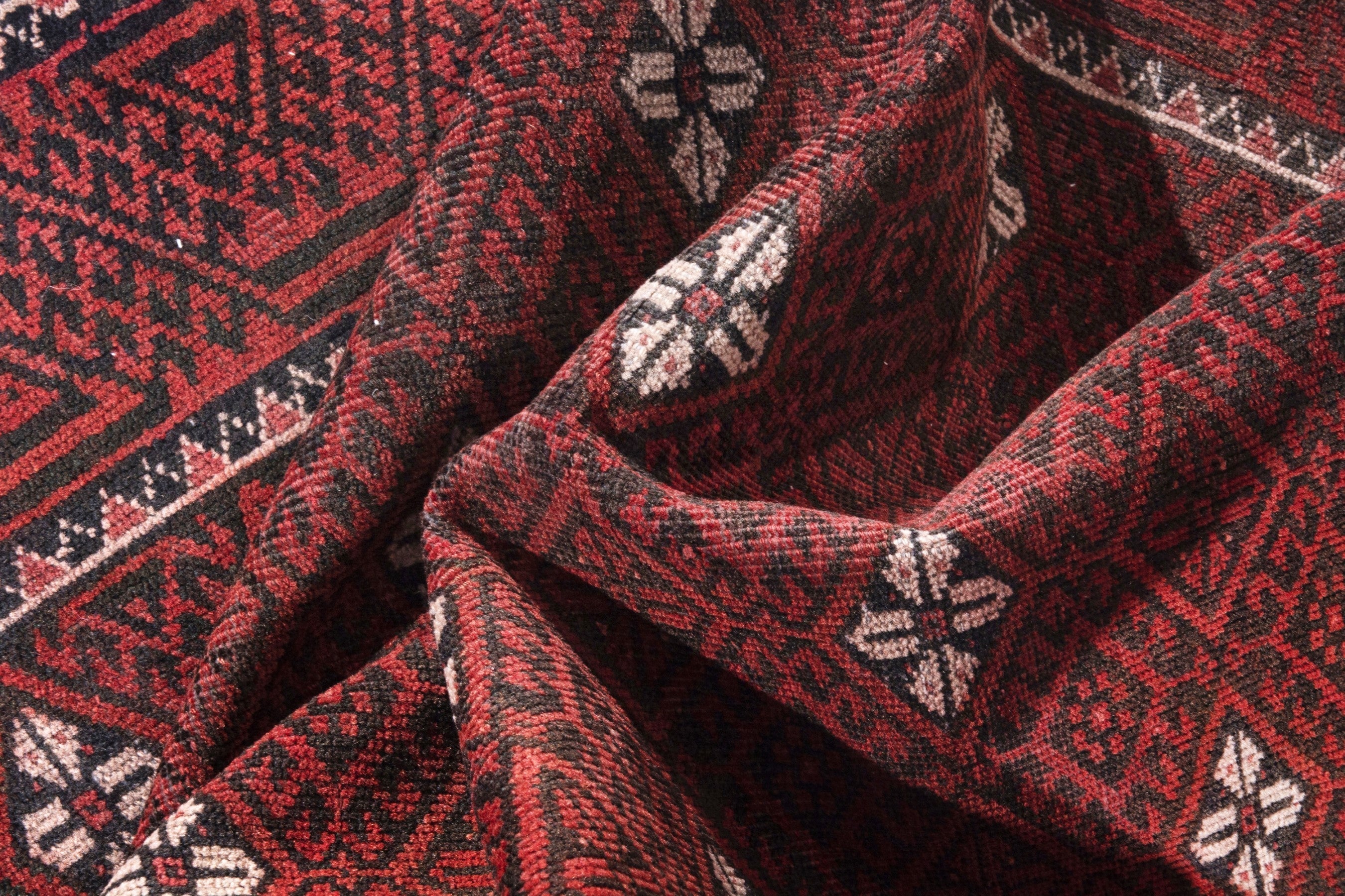 Persian Baluch accent rug in deep red and cream, view 16 of 18