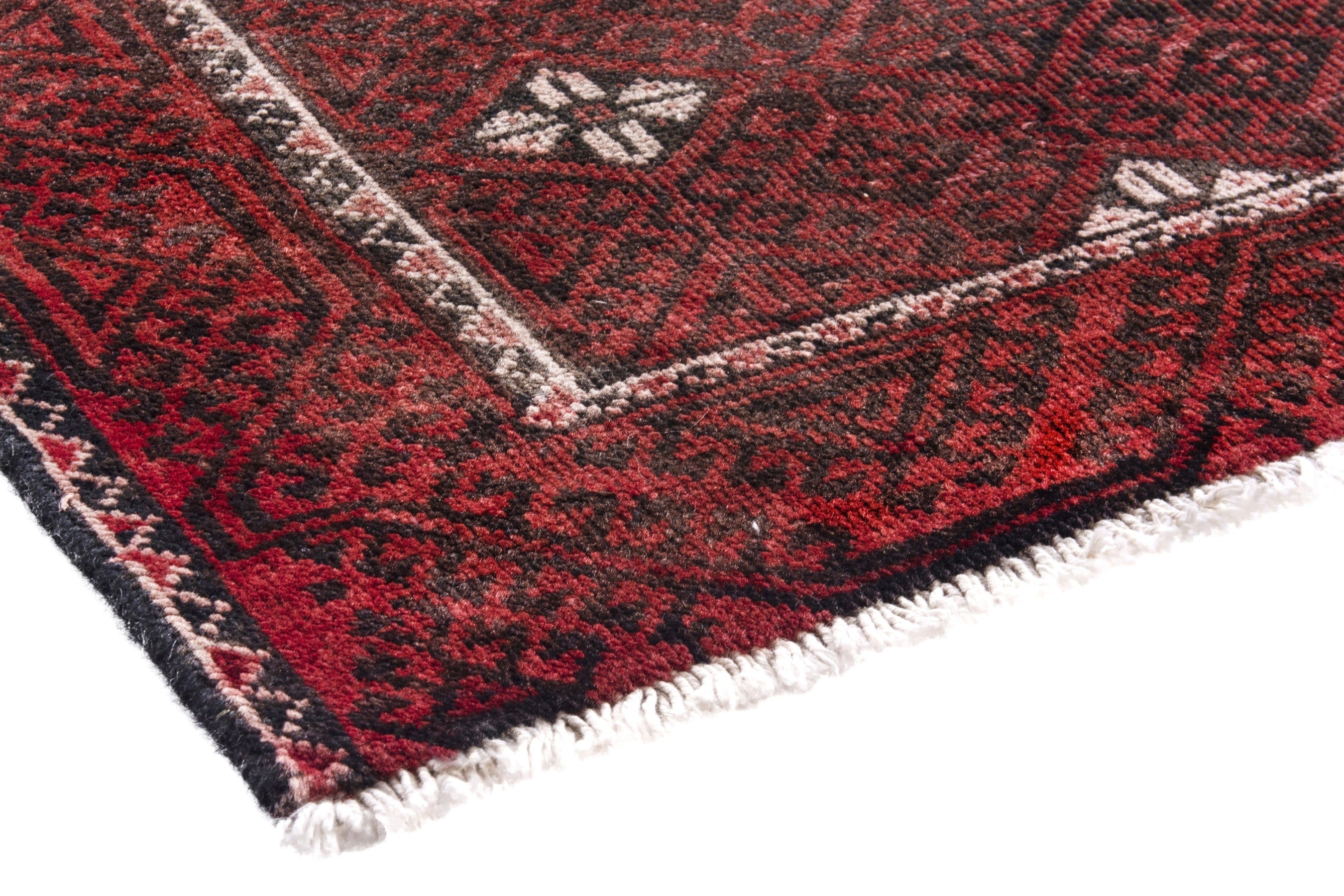 Persian Baluch accent rug in deep red and cream, view 4 of 18