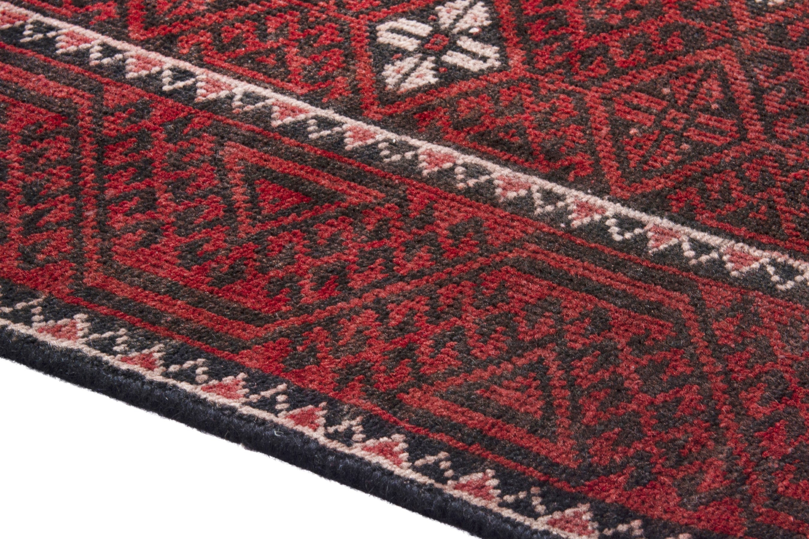 Persian Baluch accent rug in deep red and cream, view 8 of 18