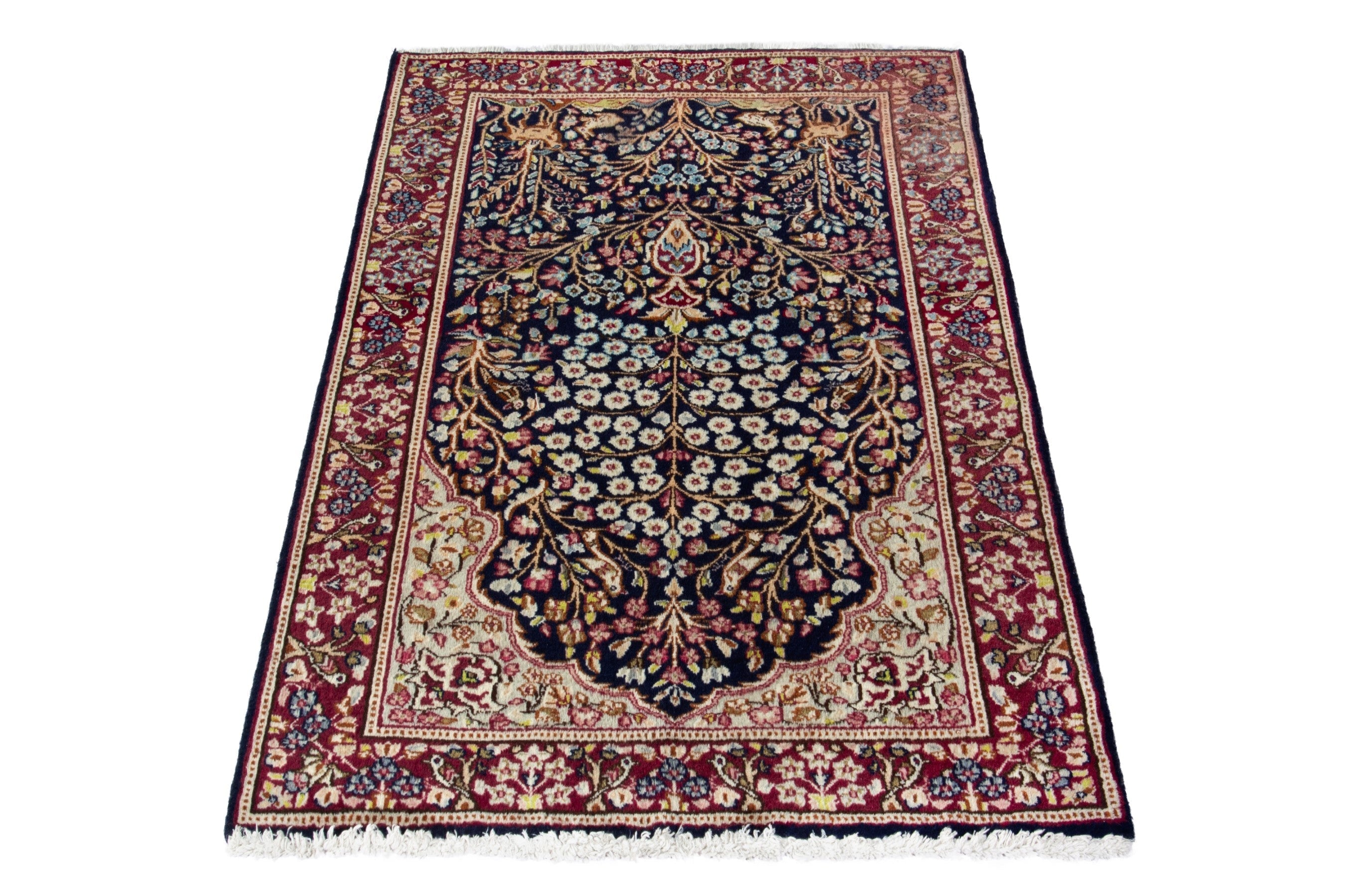 Persian Kerman accent rug in navy and burgundy, view 2 of 18