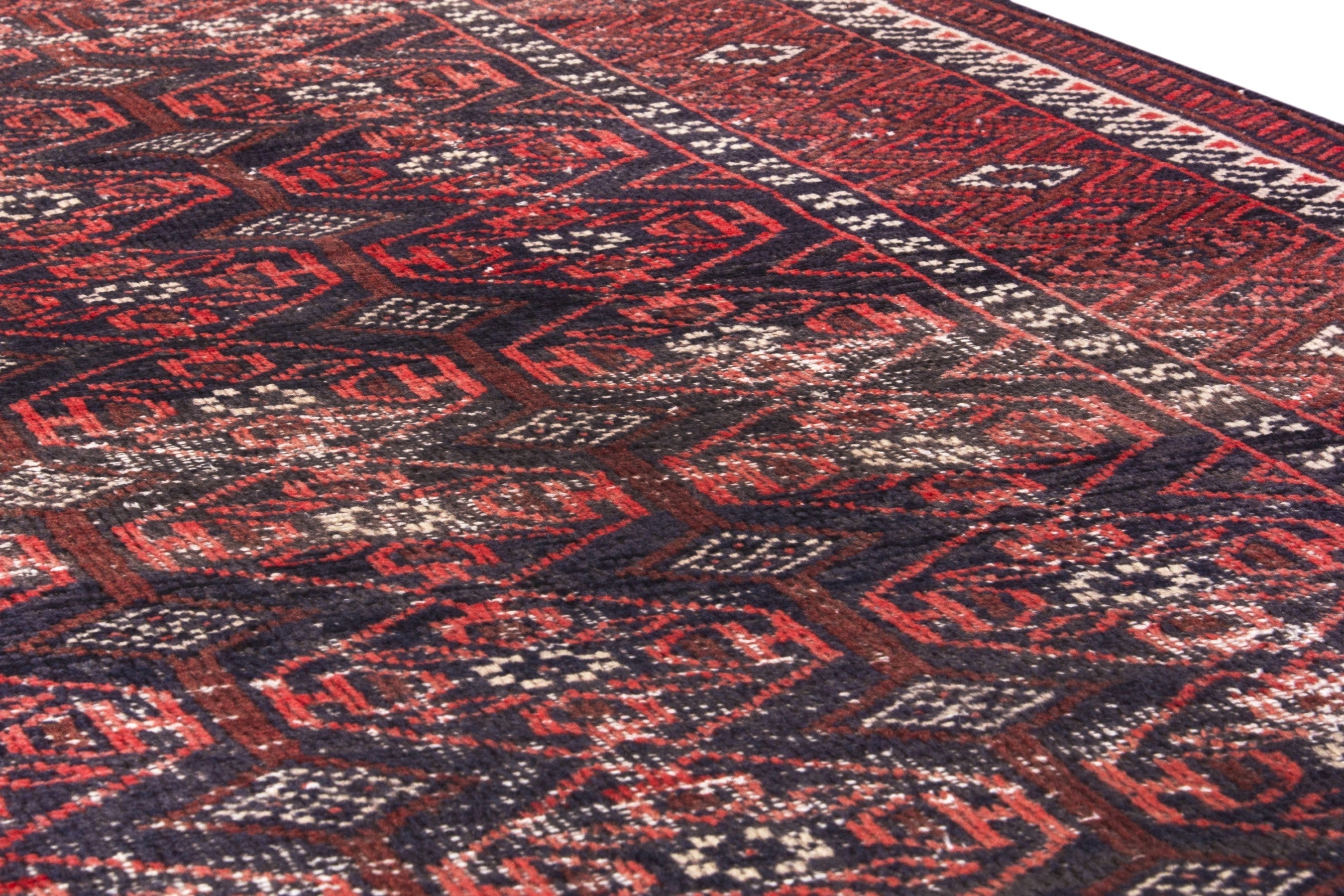 Persian Baluch area rug in deep red and burgundy, view 10 of 17
