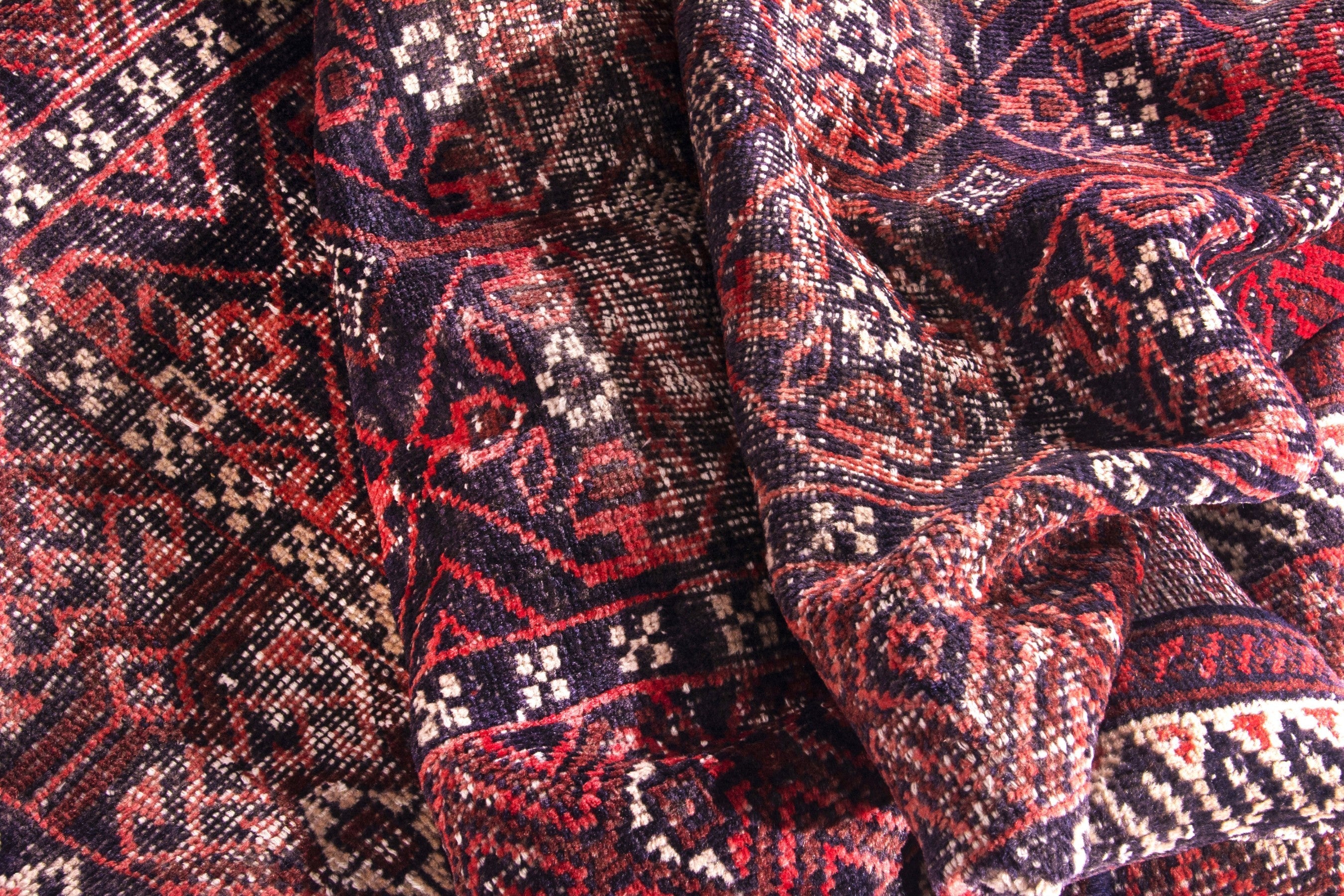 Persian Baluch area rug in deep red and burgundy, view 15 of 17