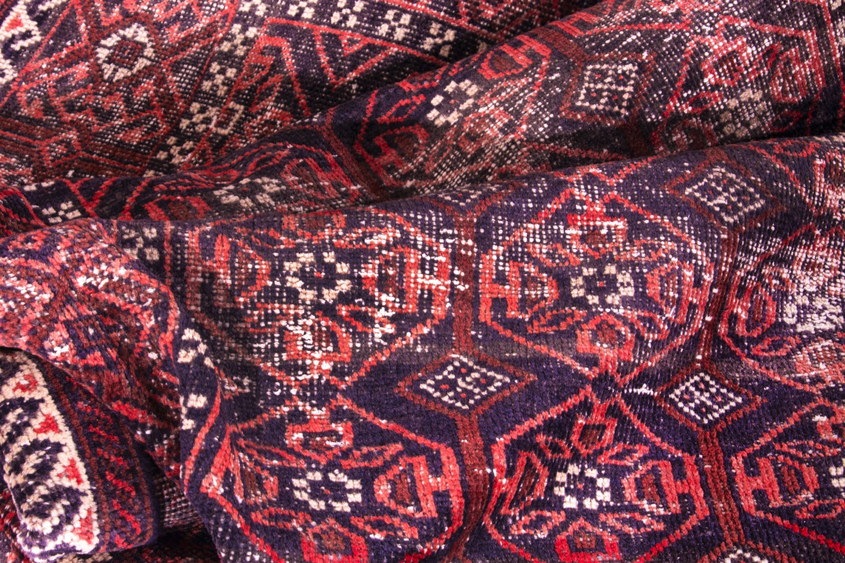 Persian Baluch area rug in deep red and burgundy, view 16 of 17