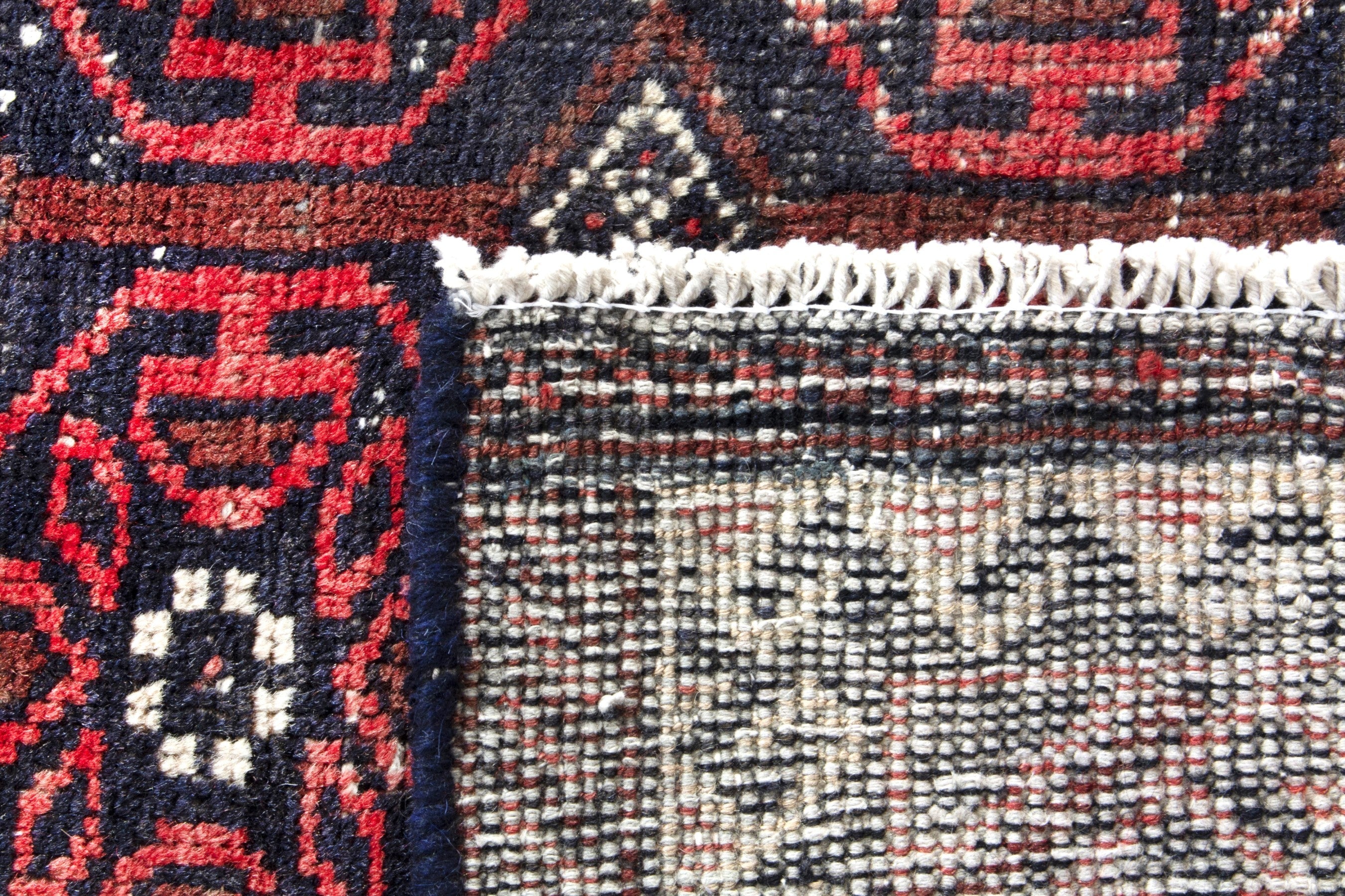 Persian Baluch area rug in deep red and burgundy, view 17 of 17