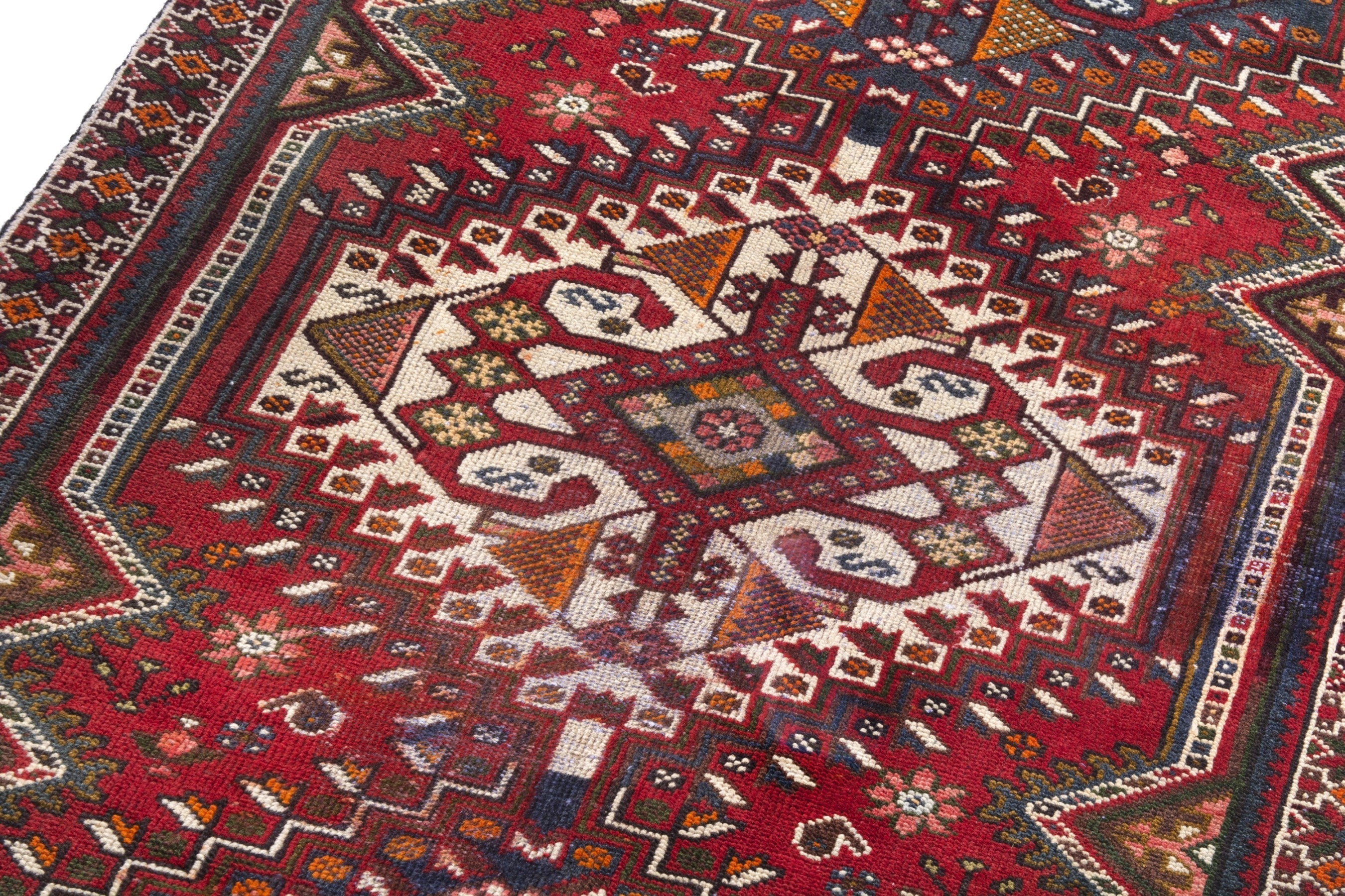 Persian Shiraz runner rug in deep red and dark blue, view 9 of 20