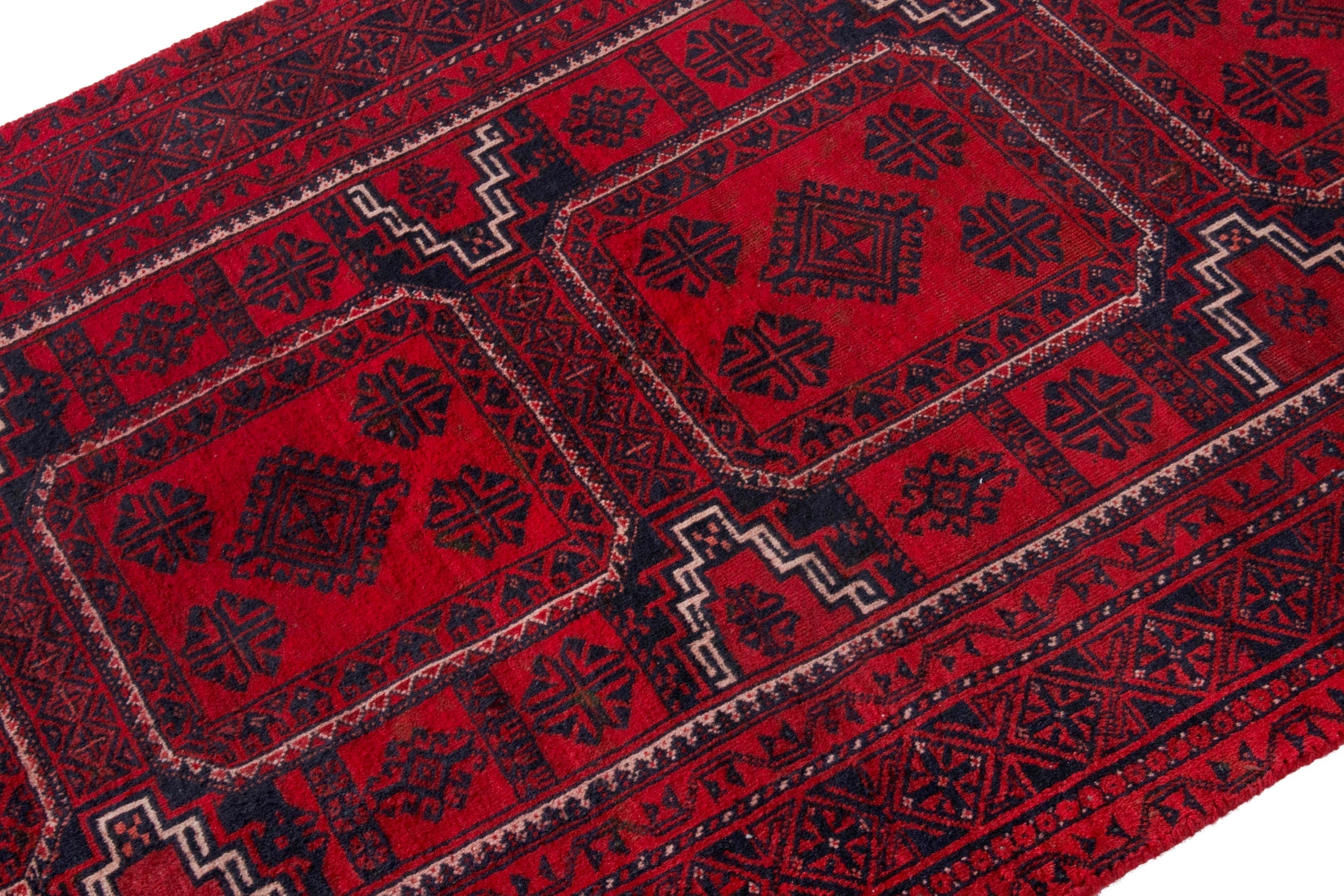 Persian Baluch runner rug in deep red and burgundy, view 6 of 20