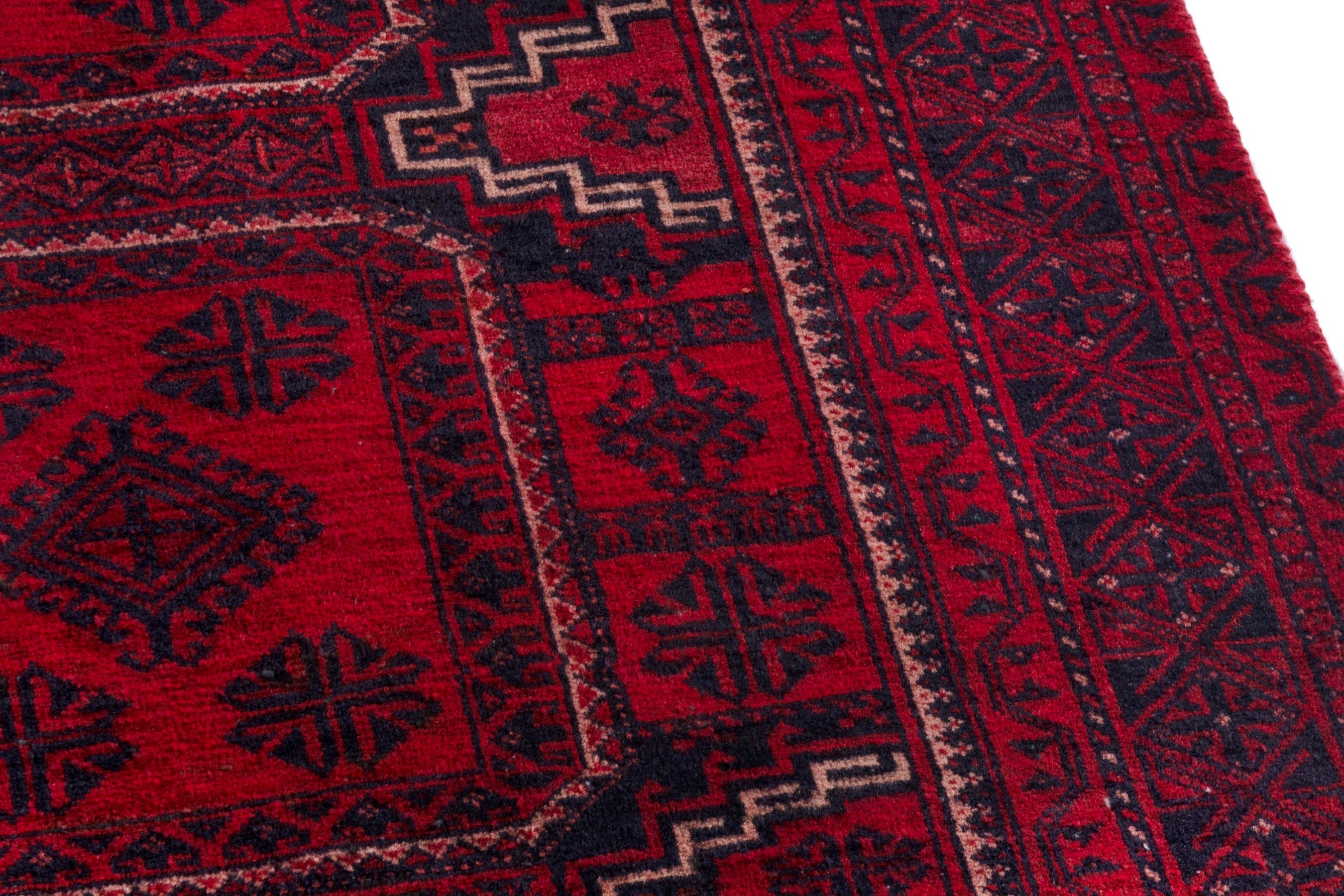 Persian Baluch runner rug in deep red and burgundy, view 7 of 20