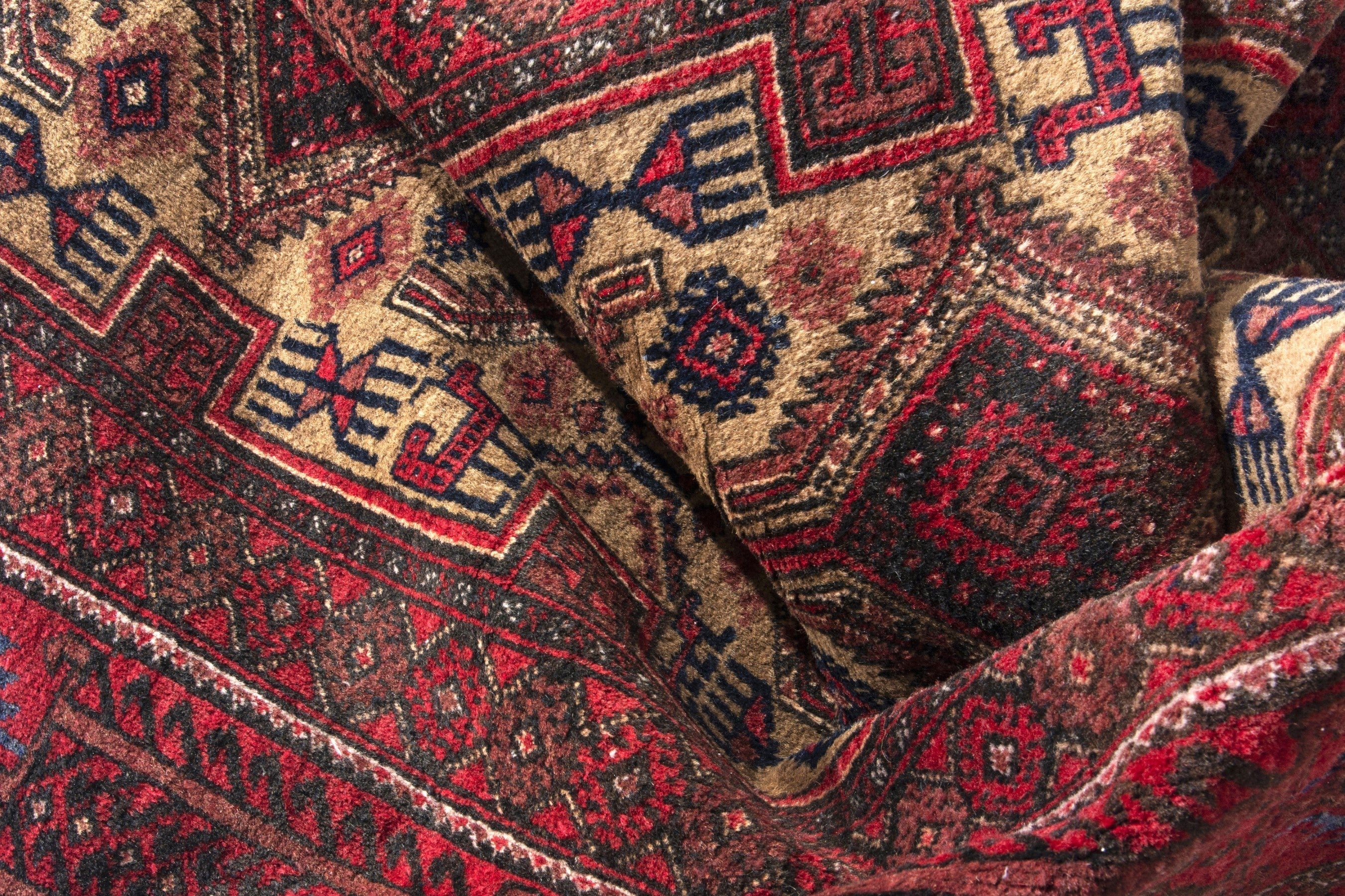 Persian Baluch runner rug in deep red and burgundy, view 16 of 17