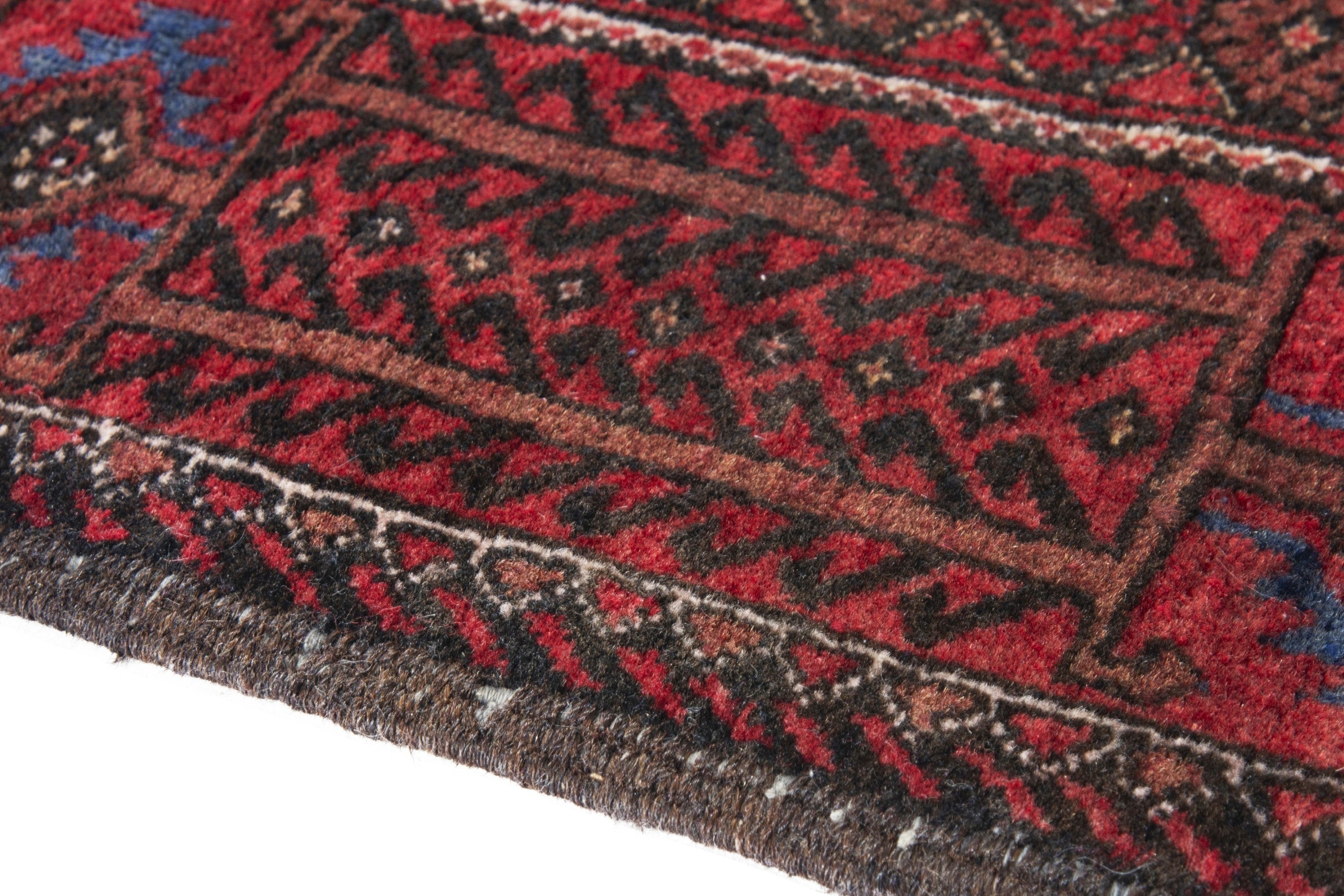 Persian Baluch runner rug in deep red and burgundy, view 8 of 17