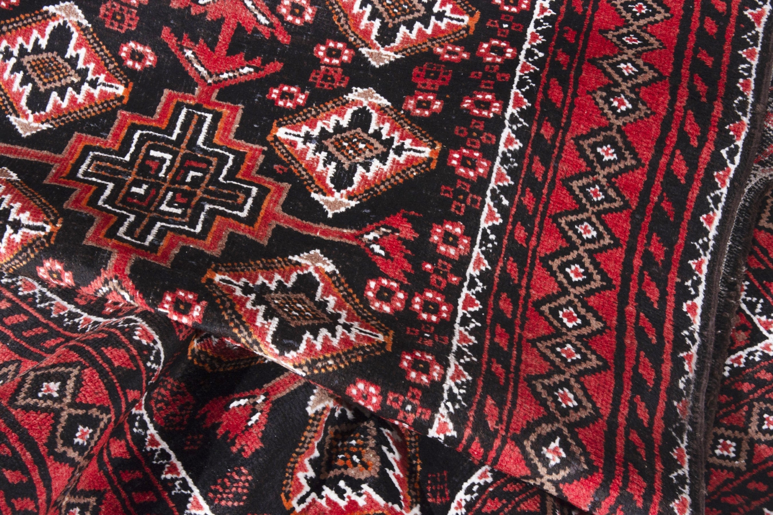 Persian Baluch accent rug in deep red and burgundy, view 17 of 18