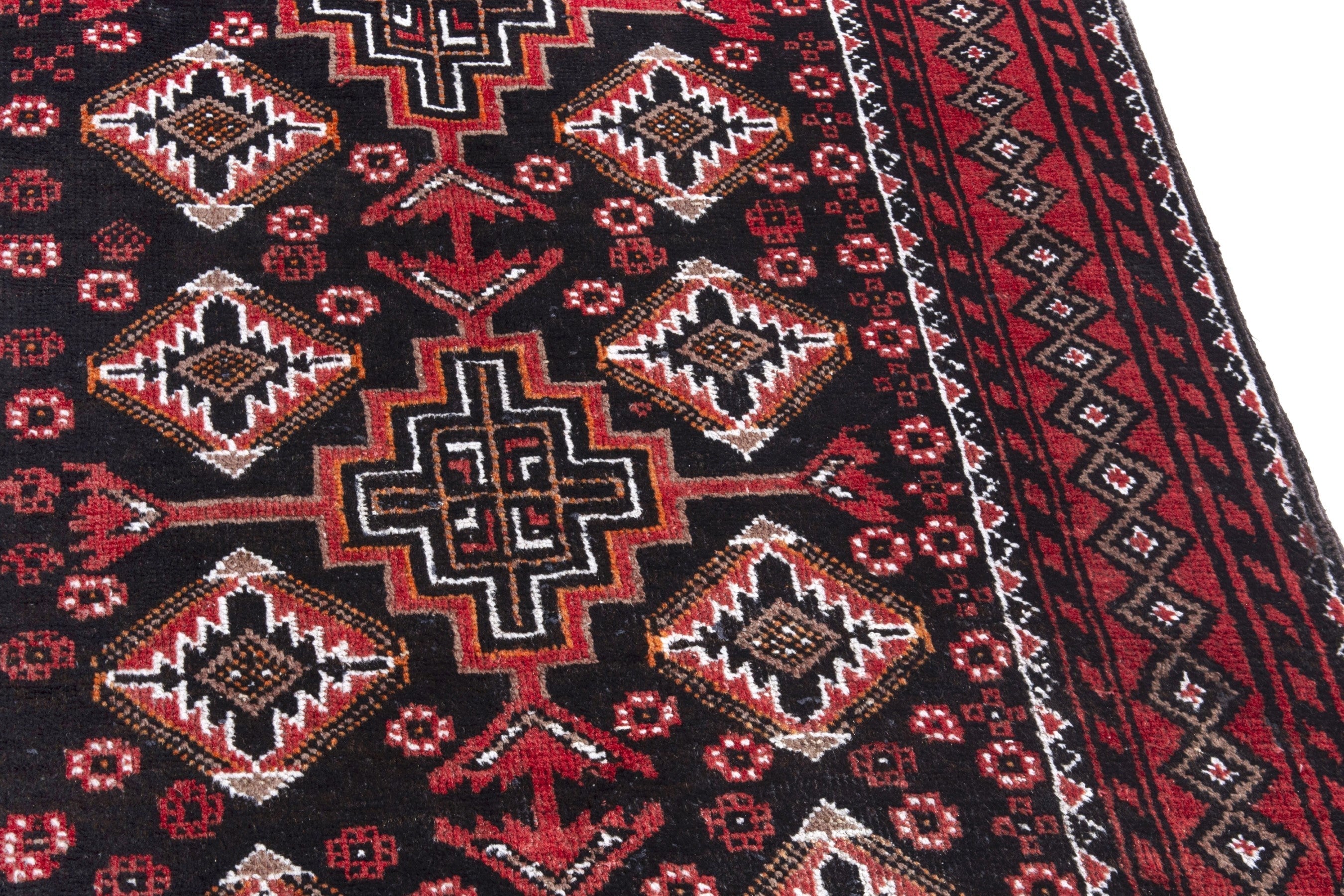 Persian Baluch accent rug in deep red and burgundy, view 7 of 18