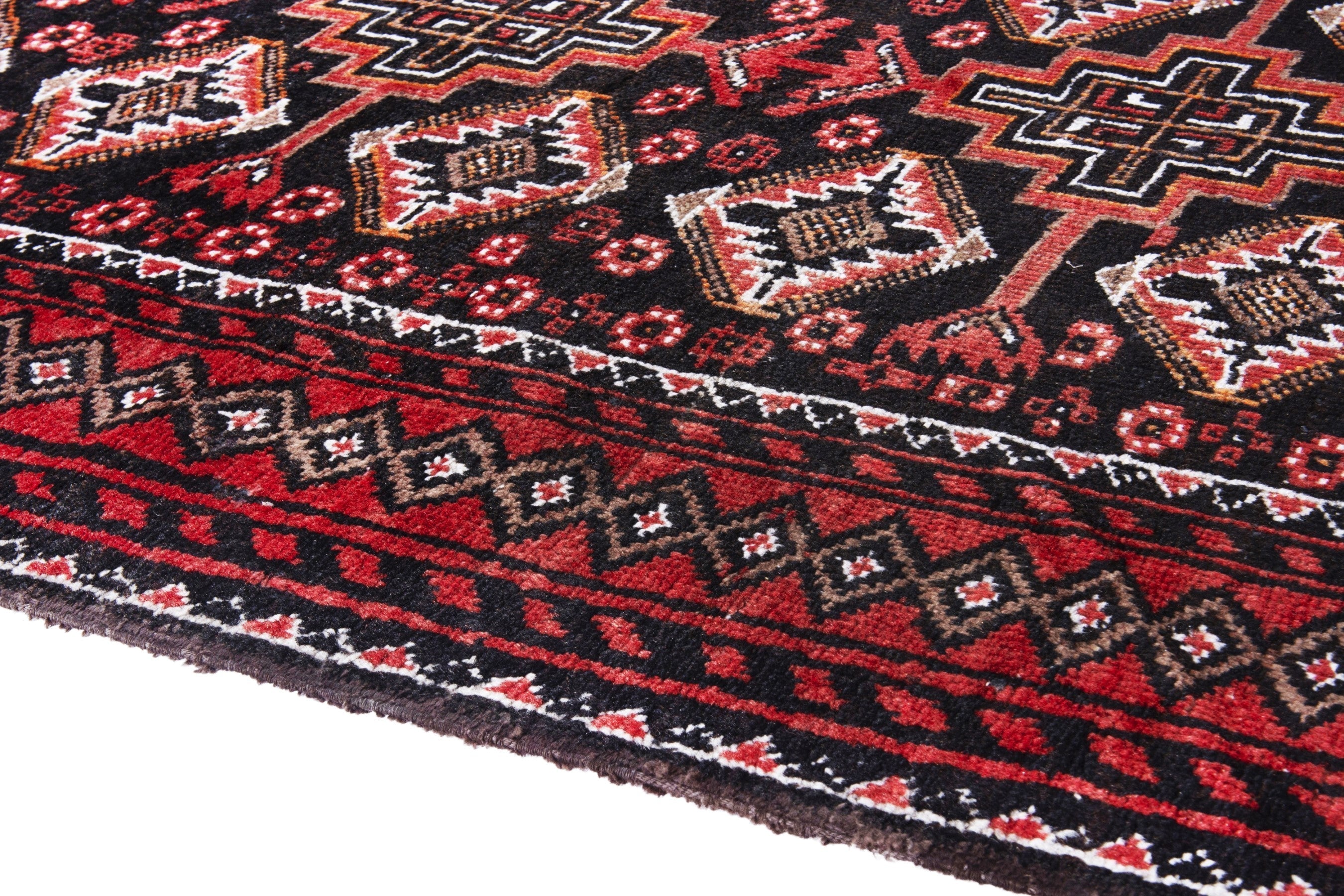 Persian Baluch accent rug in deep red and burgundy, view 8 of 18