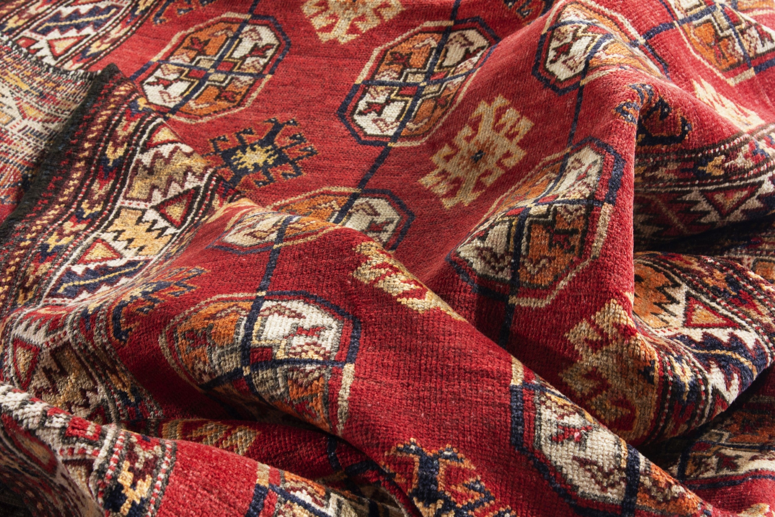 Persian Baluch runner rug in deep red and cream, view 16 of 17