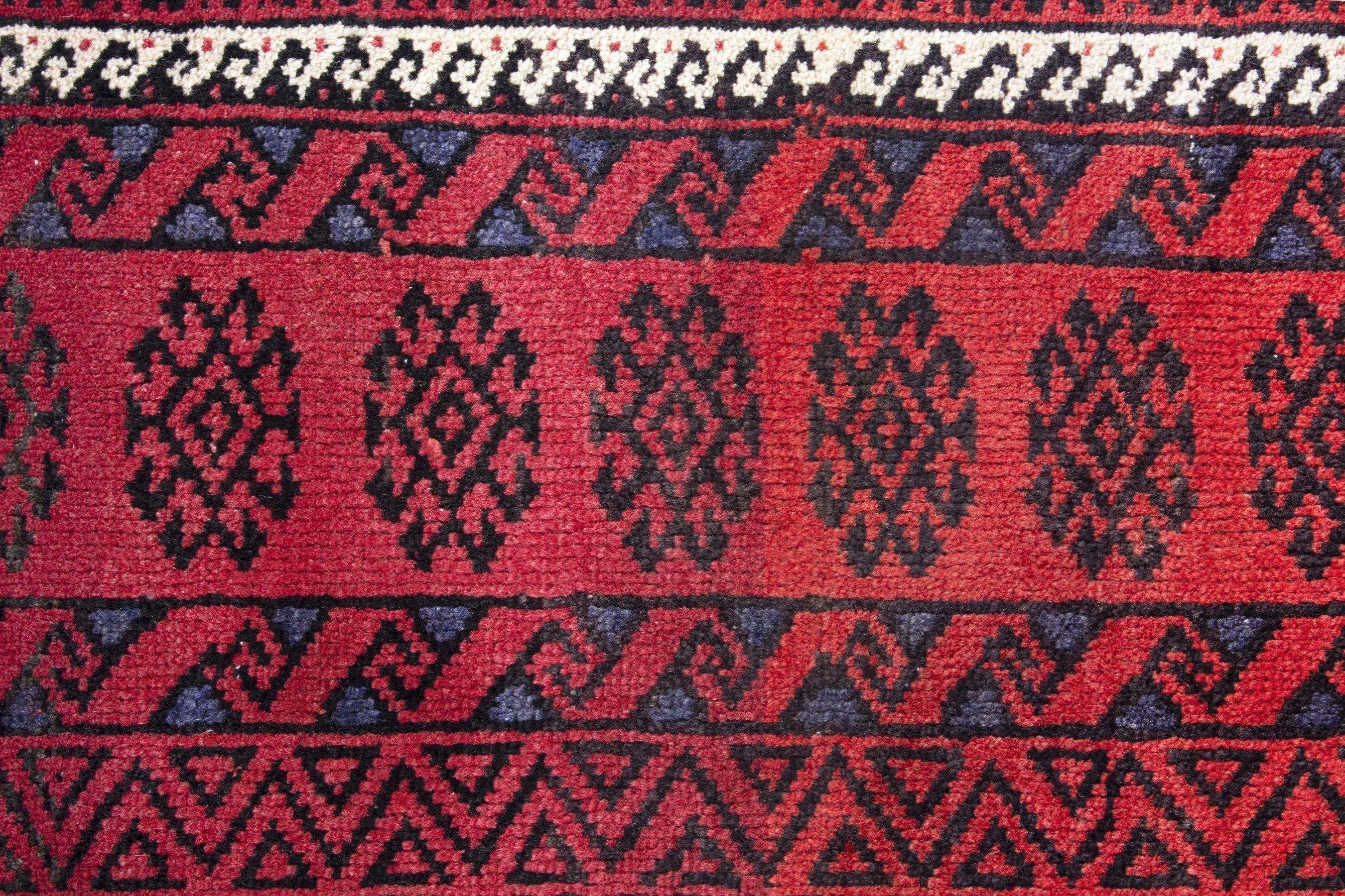 Persian Baluch runner rug in deep red and burgundy, view 12 of 18