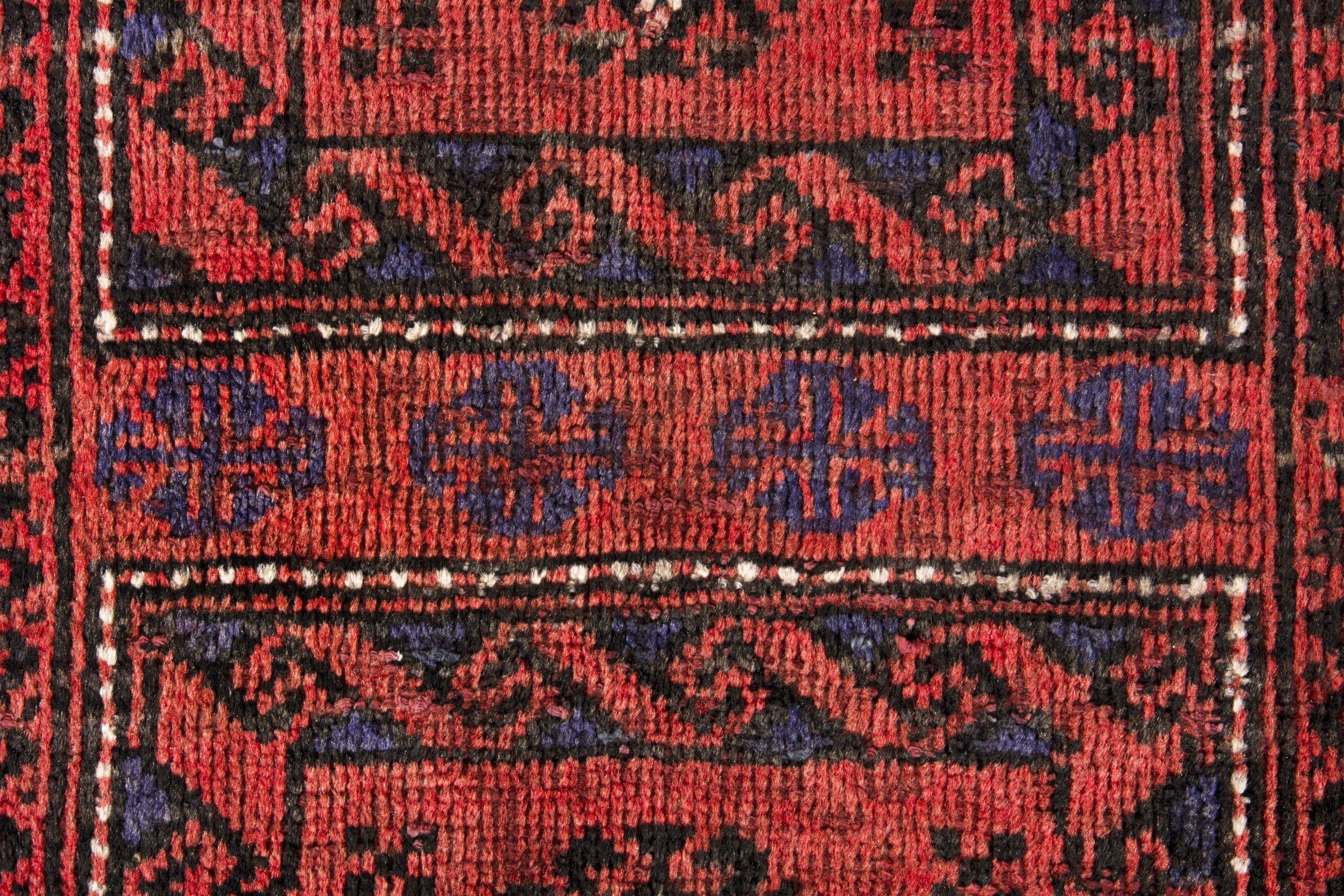 Persian Baluch runner rug in deep red and burgundy, view 13 of 18