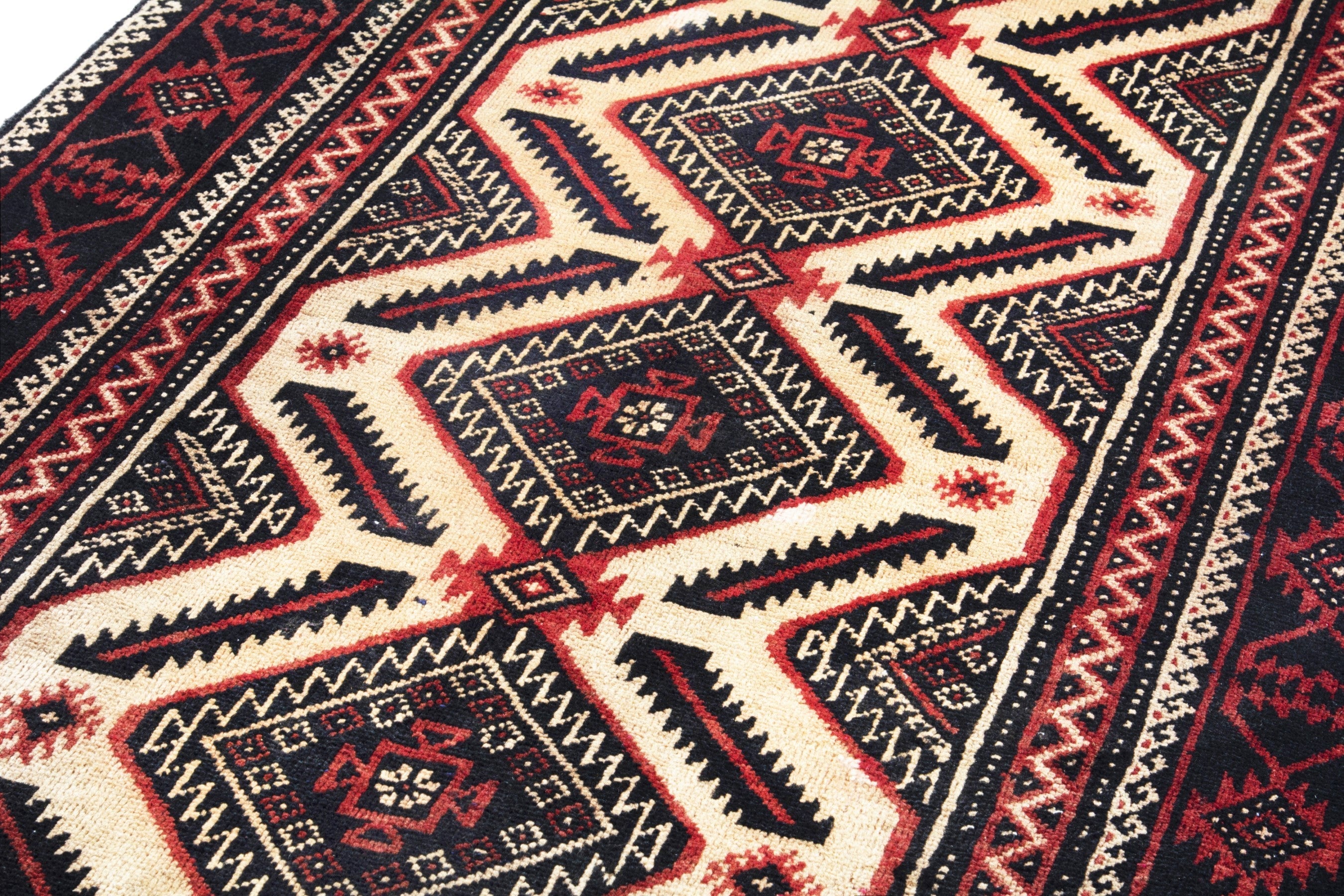 Persian Torkaman accent rug in deep red and cream, view 9 of 18
