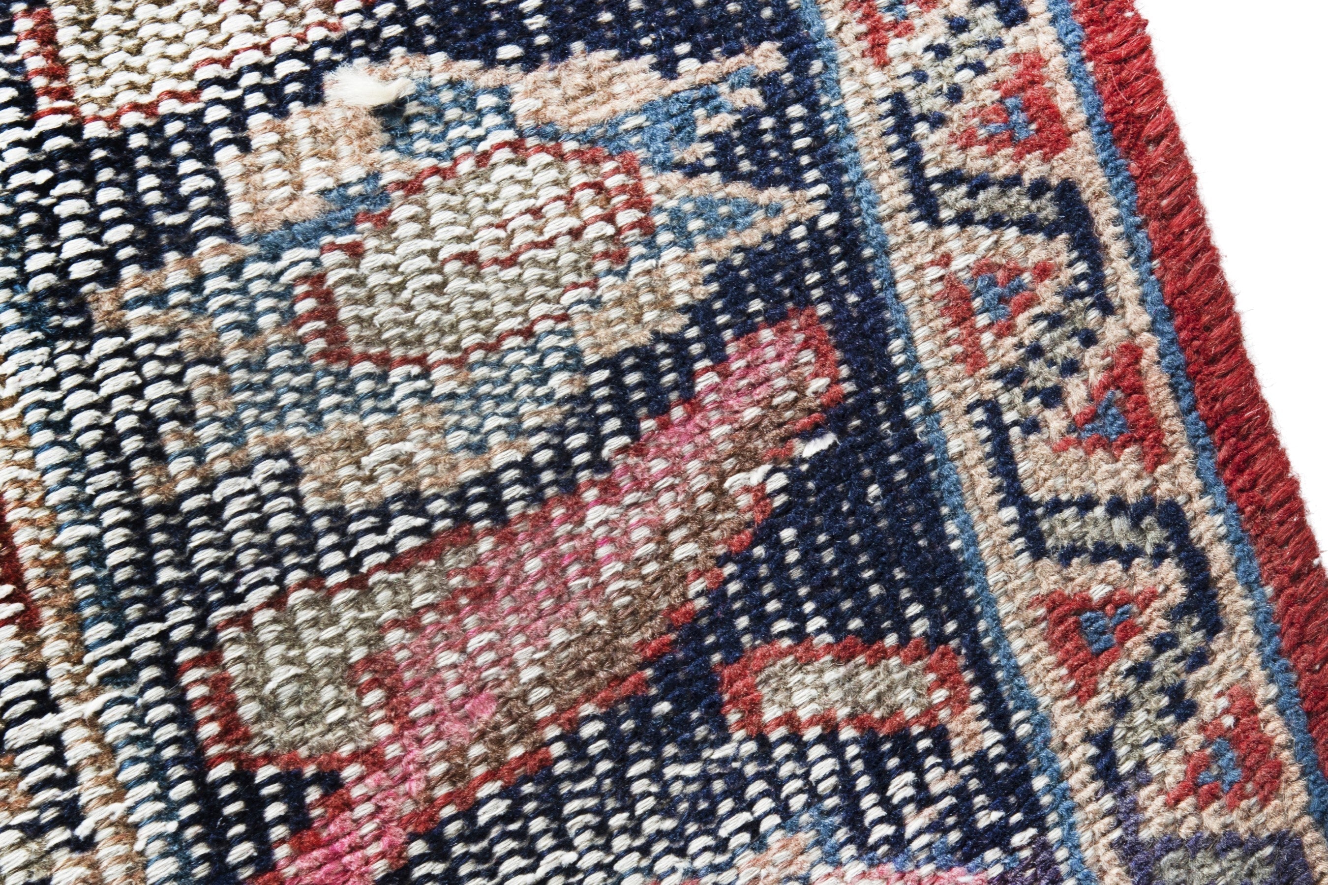 Persian Ferdos runner rug in faded red and navy, view 7 of 18