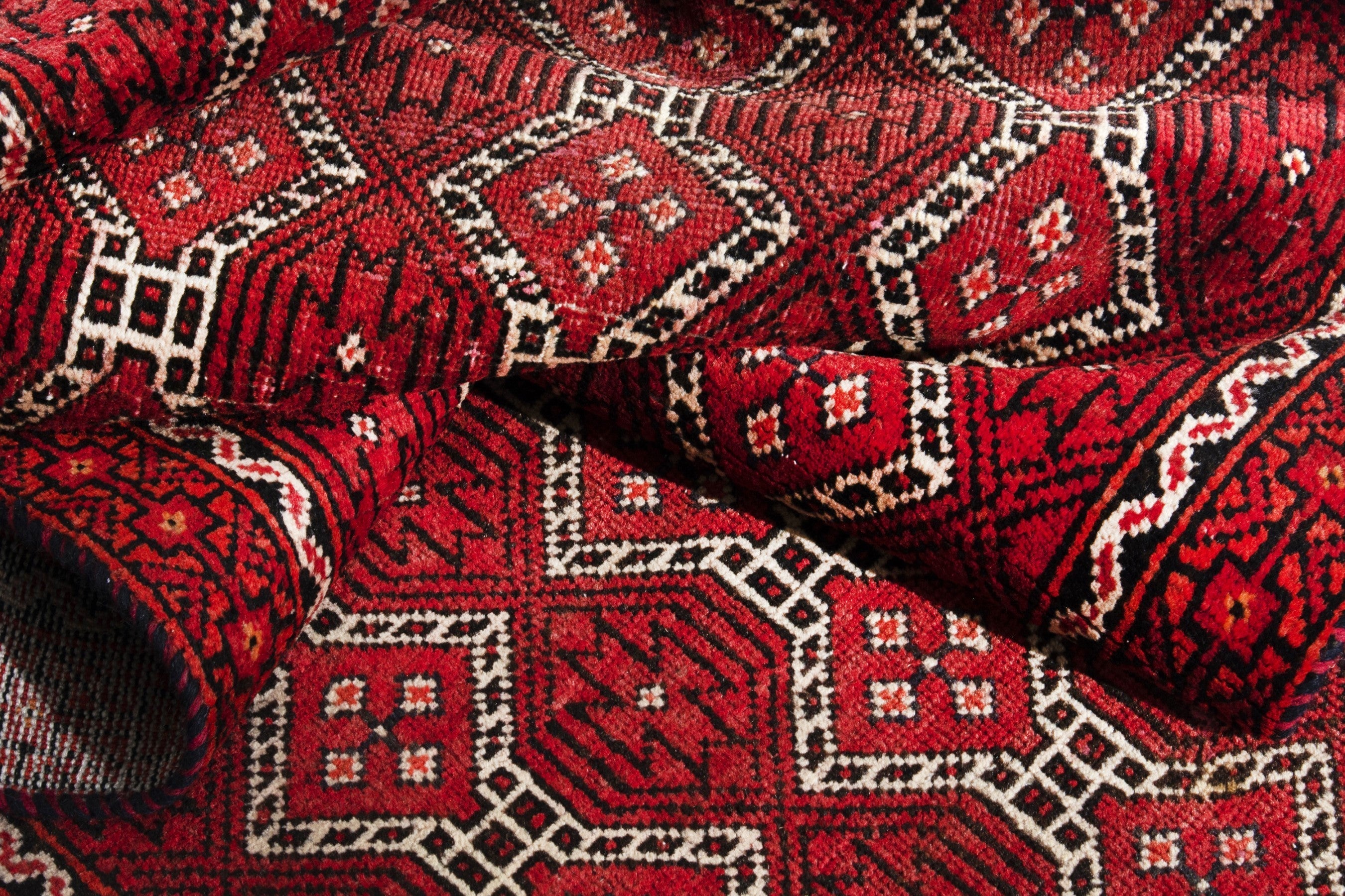 Persian Baluch runner rug in deep red and cream, view 15 of 17