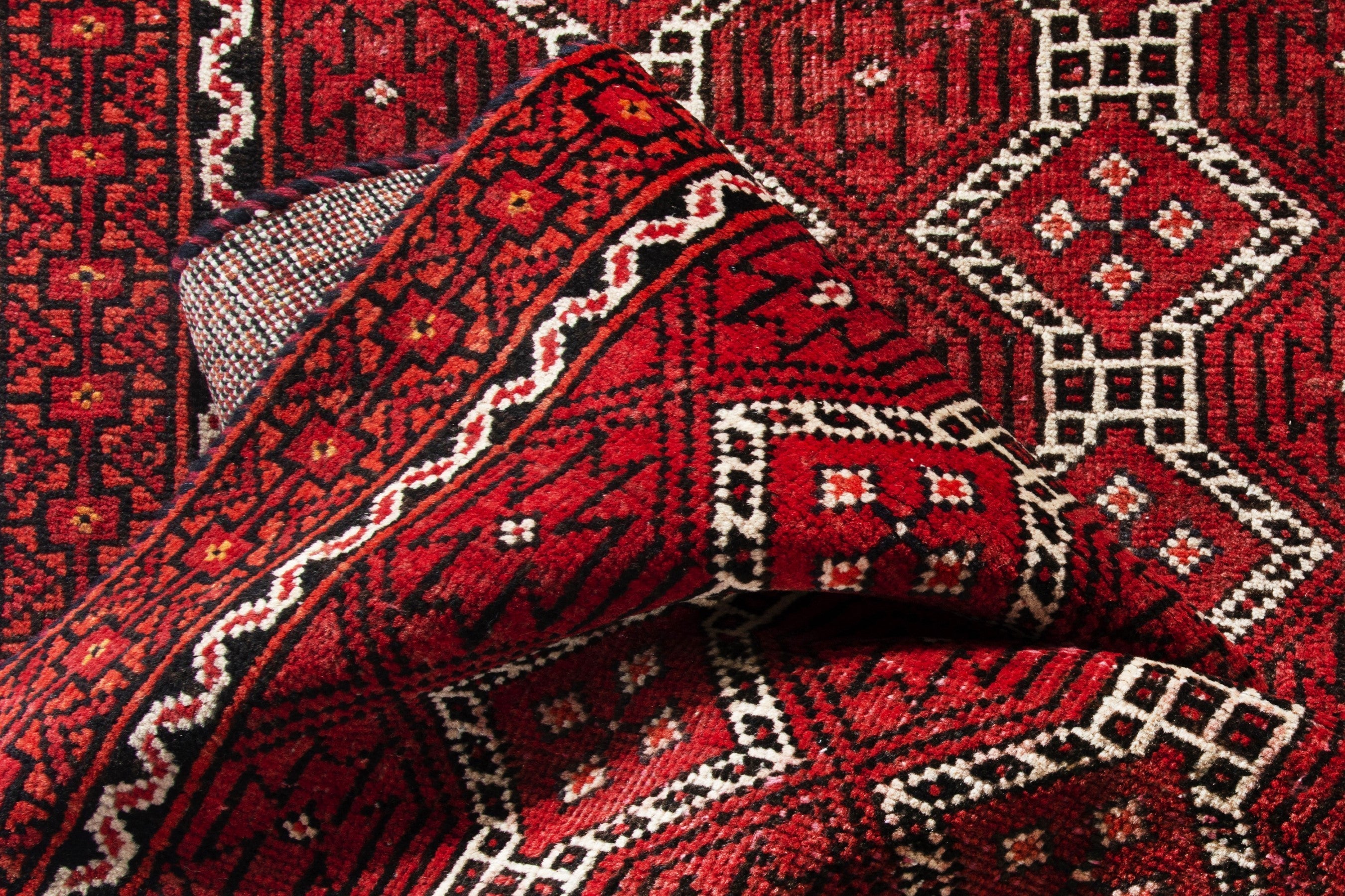 Persian Baluch runner rug in deep red and cream, view 16 of 17